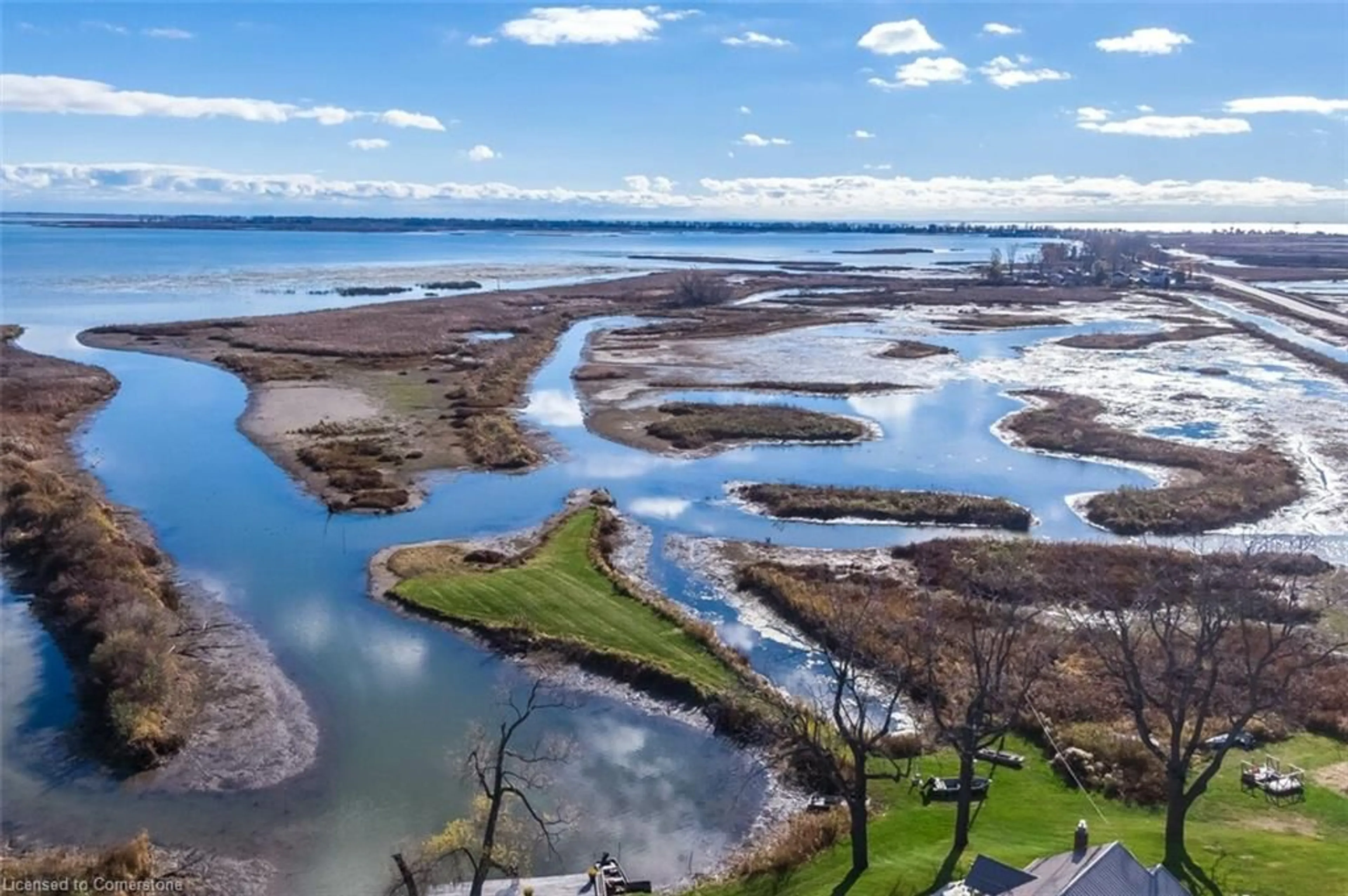 A pic from outside/outdoor area/front of a property/back of a property/a pic from drone, water/lake/river/ocean view for 982 59 Hwy, Port Rowan Ontario N0E 1M0