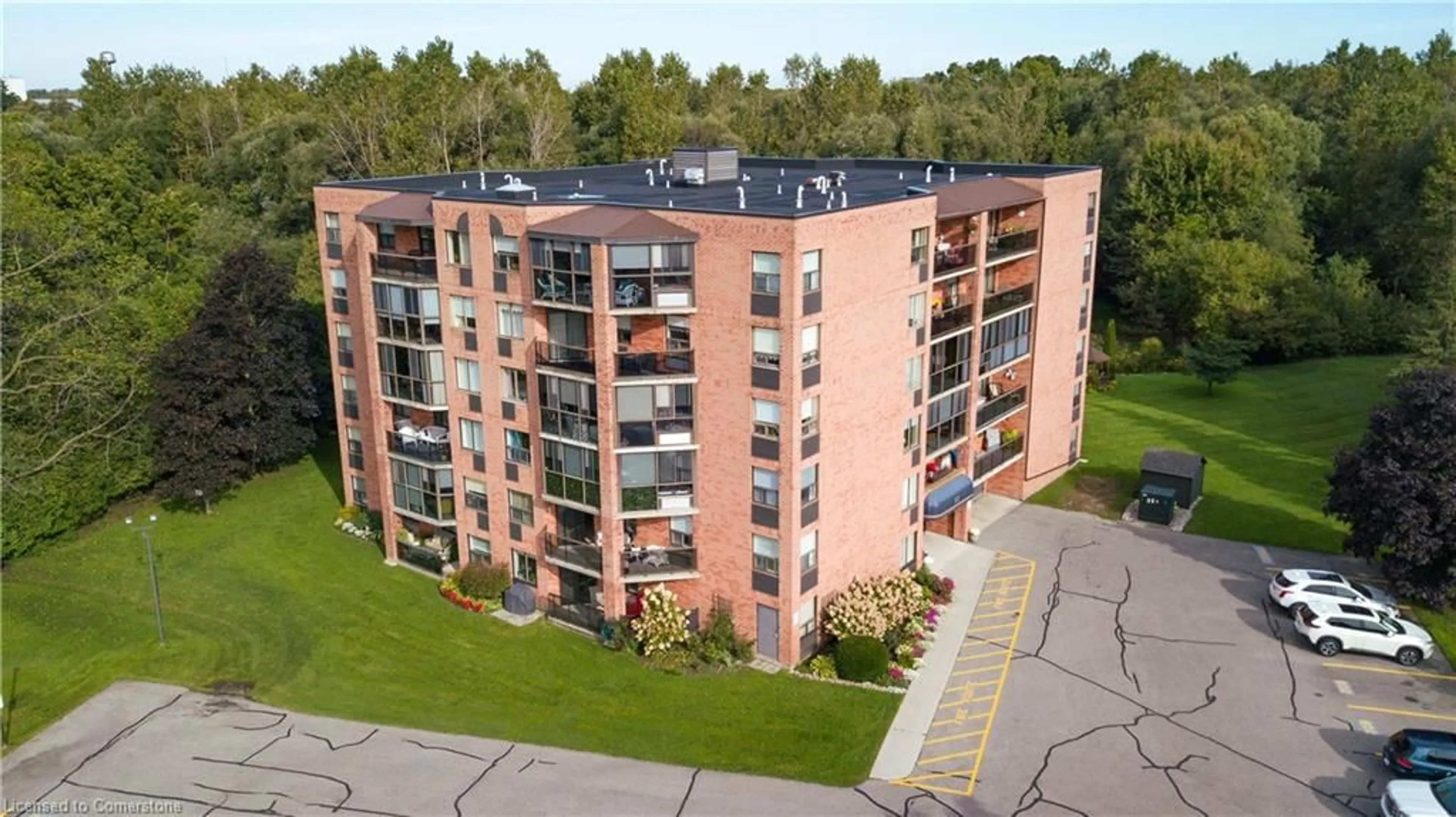 A pic from outside/outdoor area/front of a property/back of a property/a pic from drone, building for 17 Mill Pond Crt #405, Simcoe Ontario N3Y 5H9