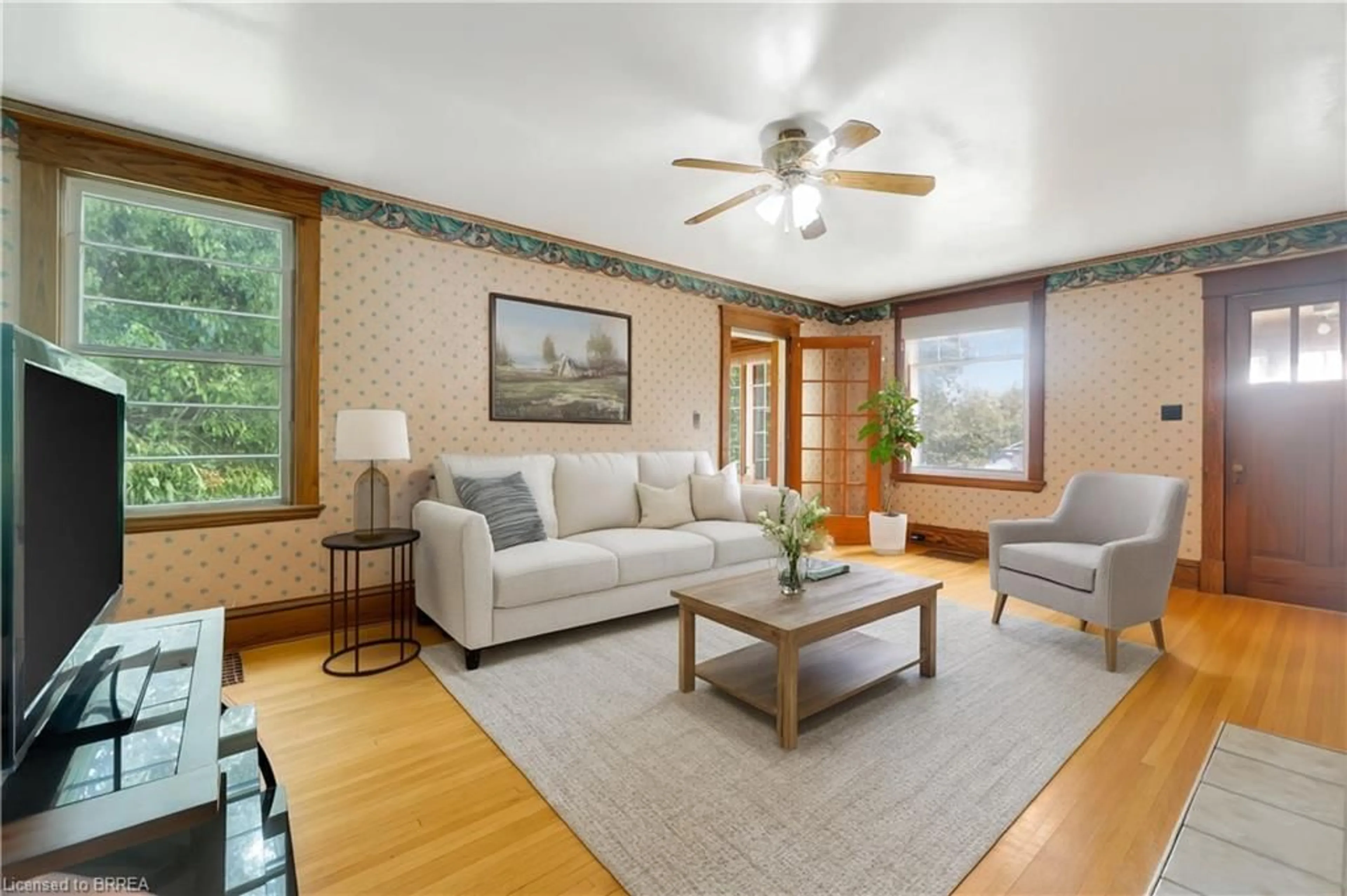 Living room with furniture, wood/laminate floor for 9 Princess St, Glen Morris Ontario N0B 1W0