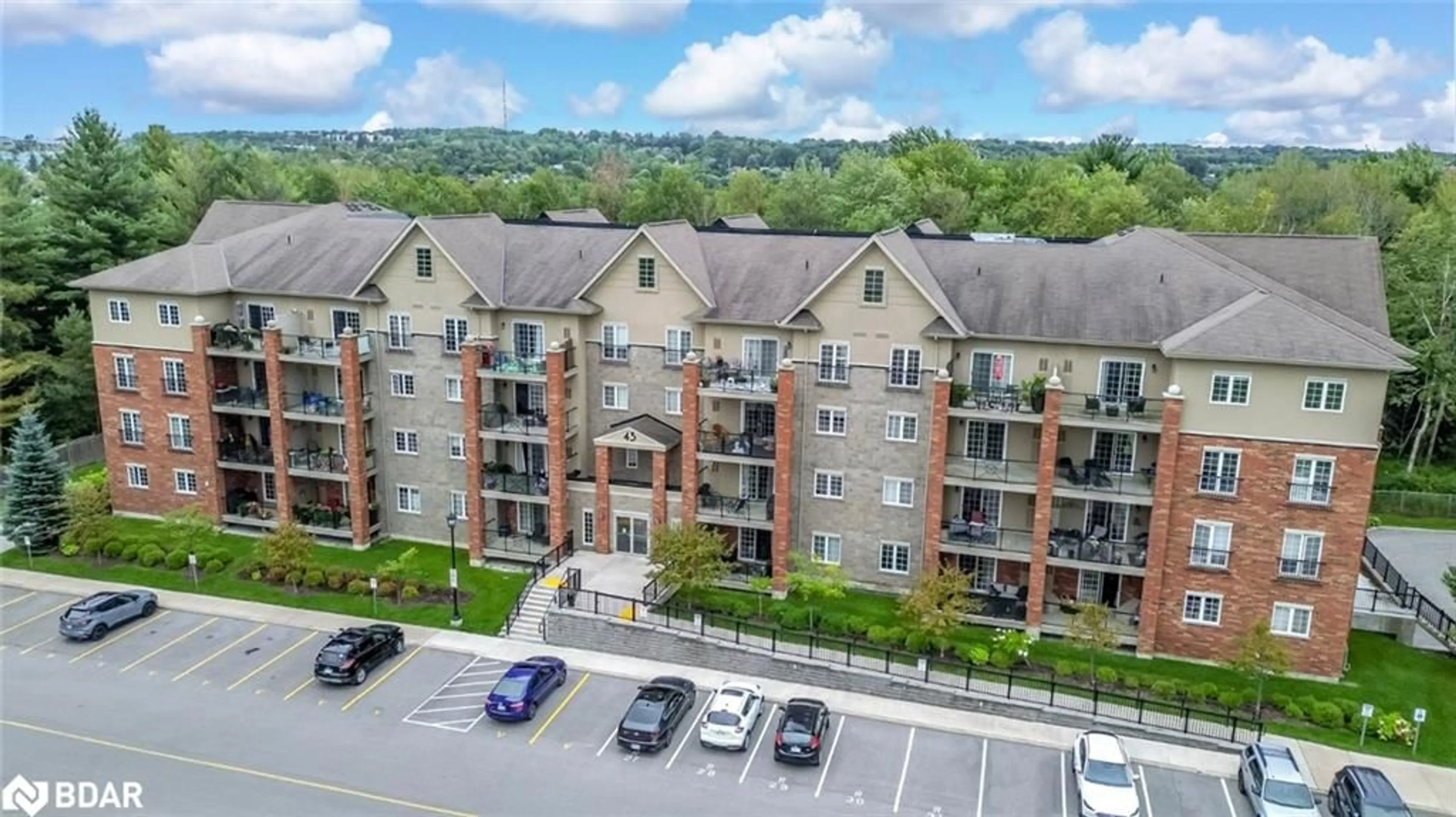 A pic from outside/outdoor area/front of a property/back of a property/a pic from drone, unknown for 43 Ferndale Dr #305, Barrie Ontario L4N 5W6