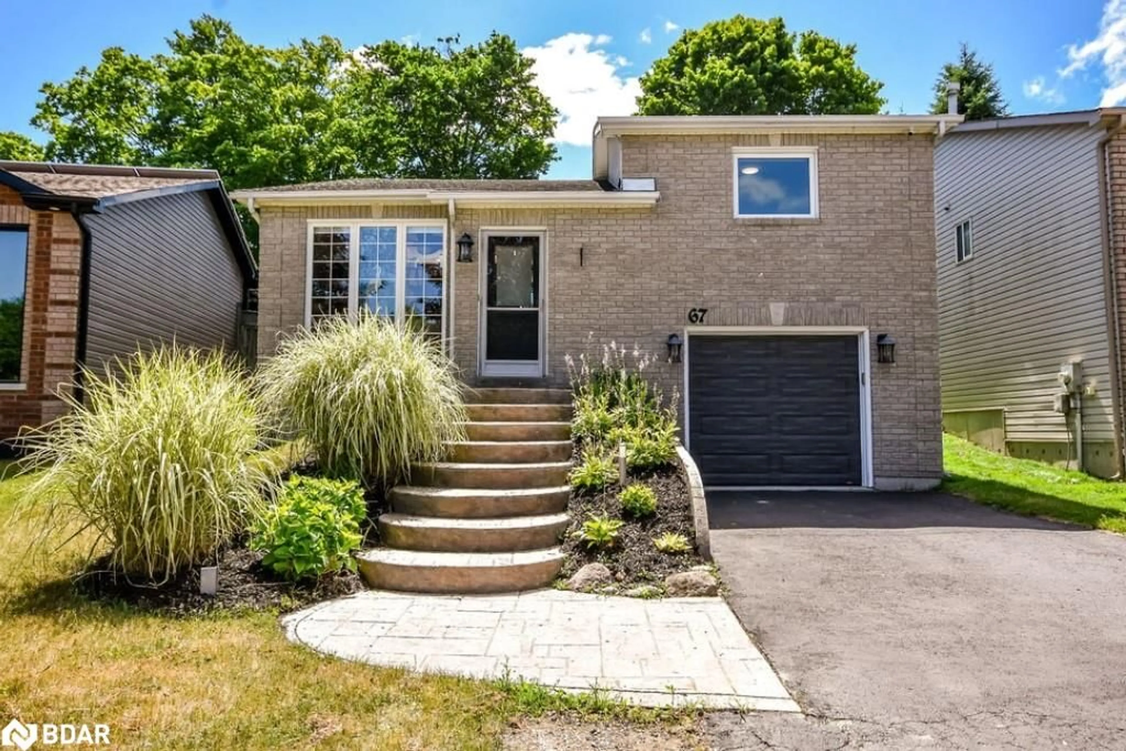 Home with brick exterior material, street for 67 Lougheed Rd, Barrie Ontario L4N 8G1