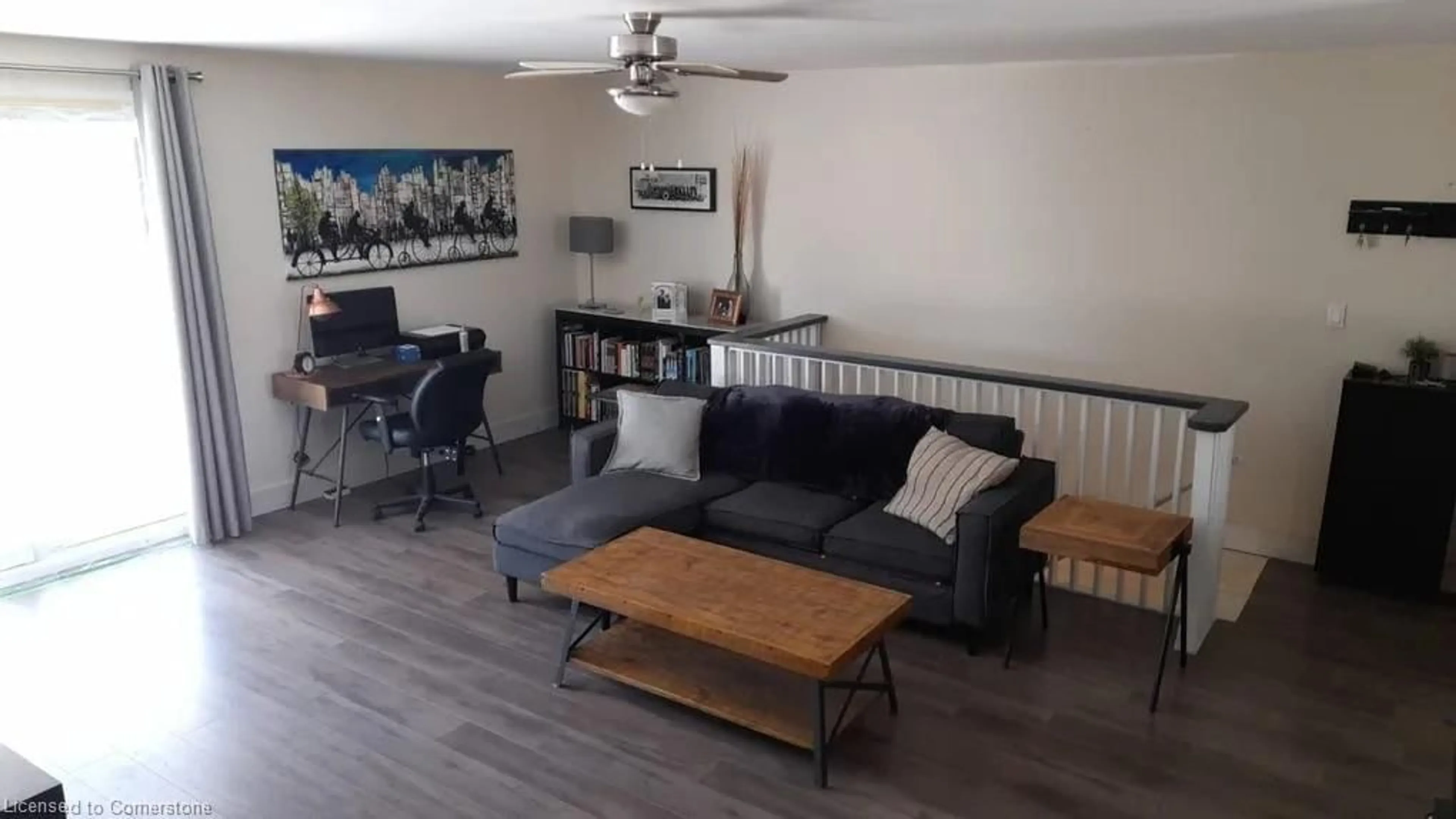 Living room with furniture, wood/laminate floor for 1010 Billings Lake Road, Gooderham Ontario K0M 1R0