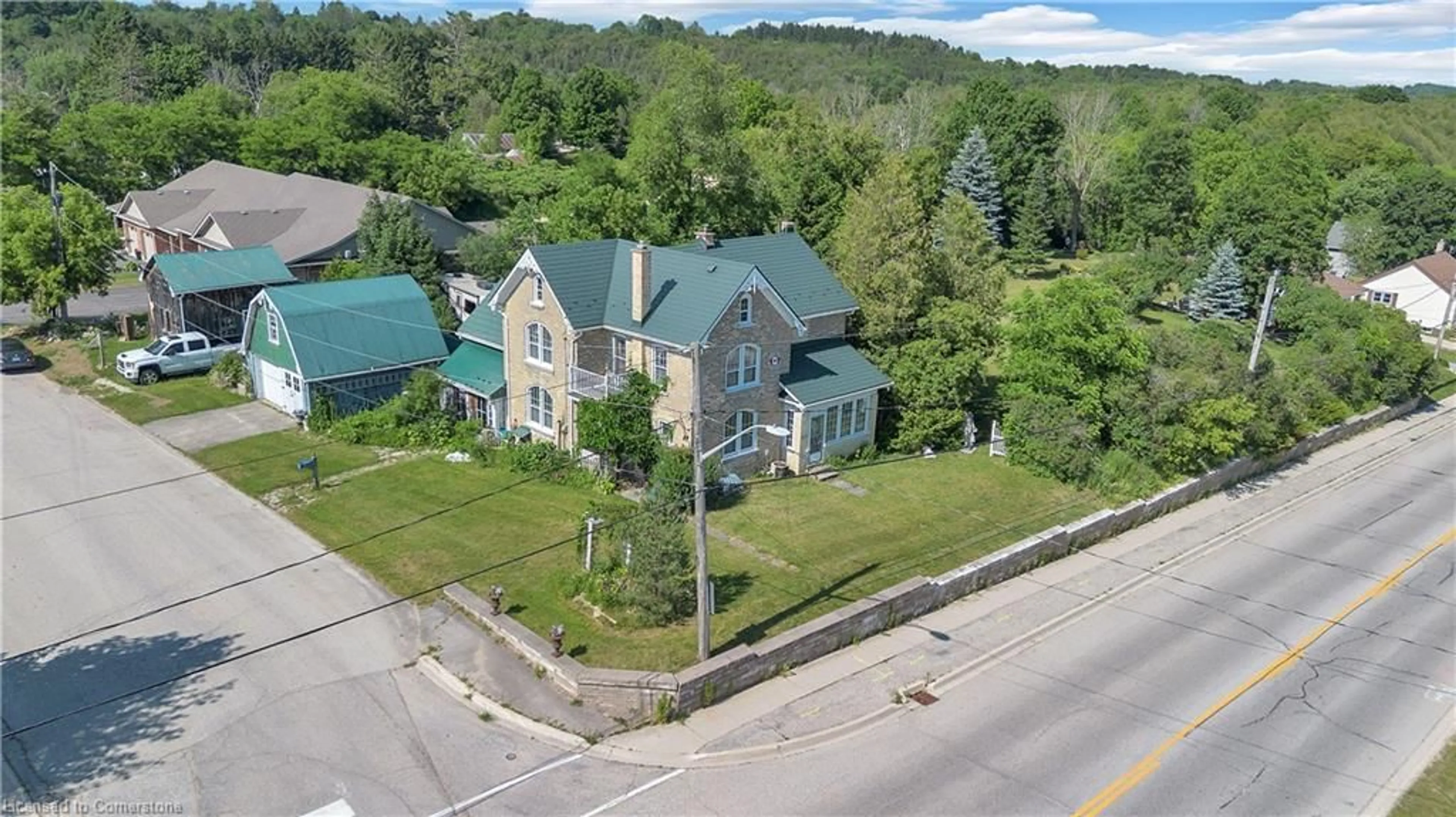 A pic from outside/outdoor area/front of a property/back of a property/a pic from drone, street for 402 Lambton St, Durham Ontario N0G 1R0