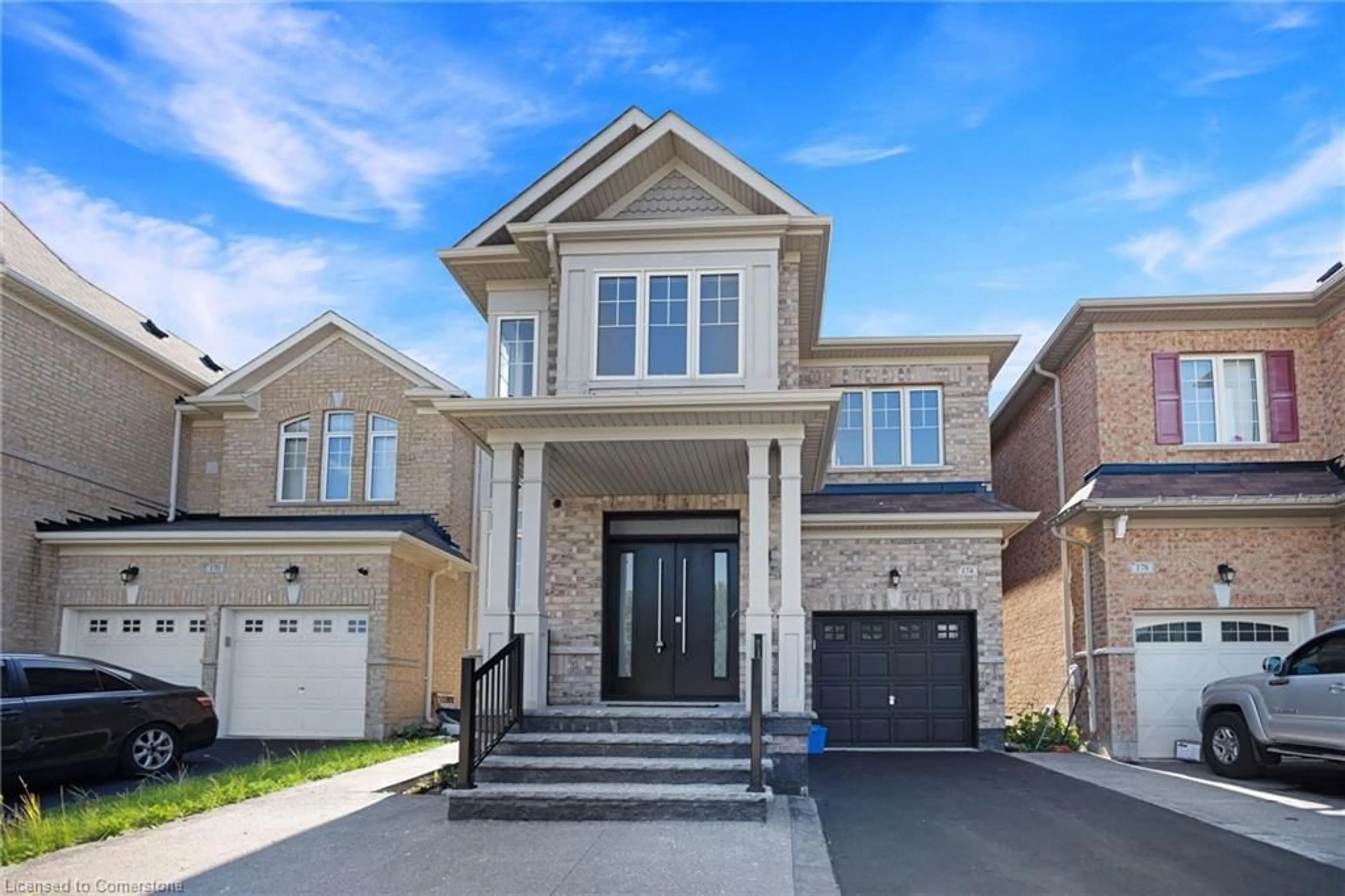 Home with brick exterior material, street for 174 Mactier Drive Dr, Kleinburg Ontario L4H 4L5