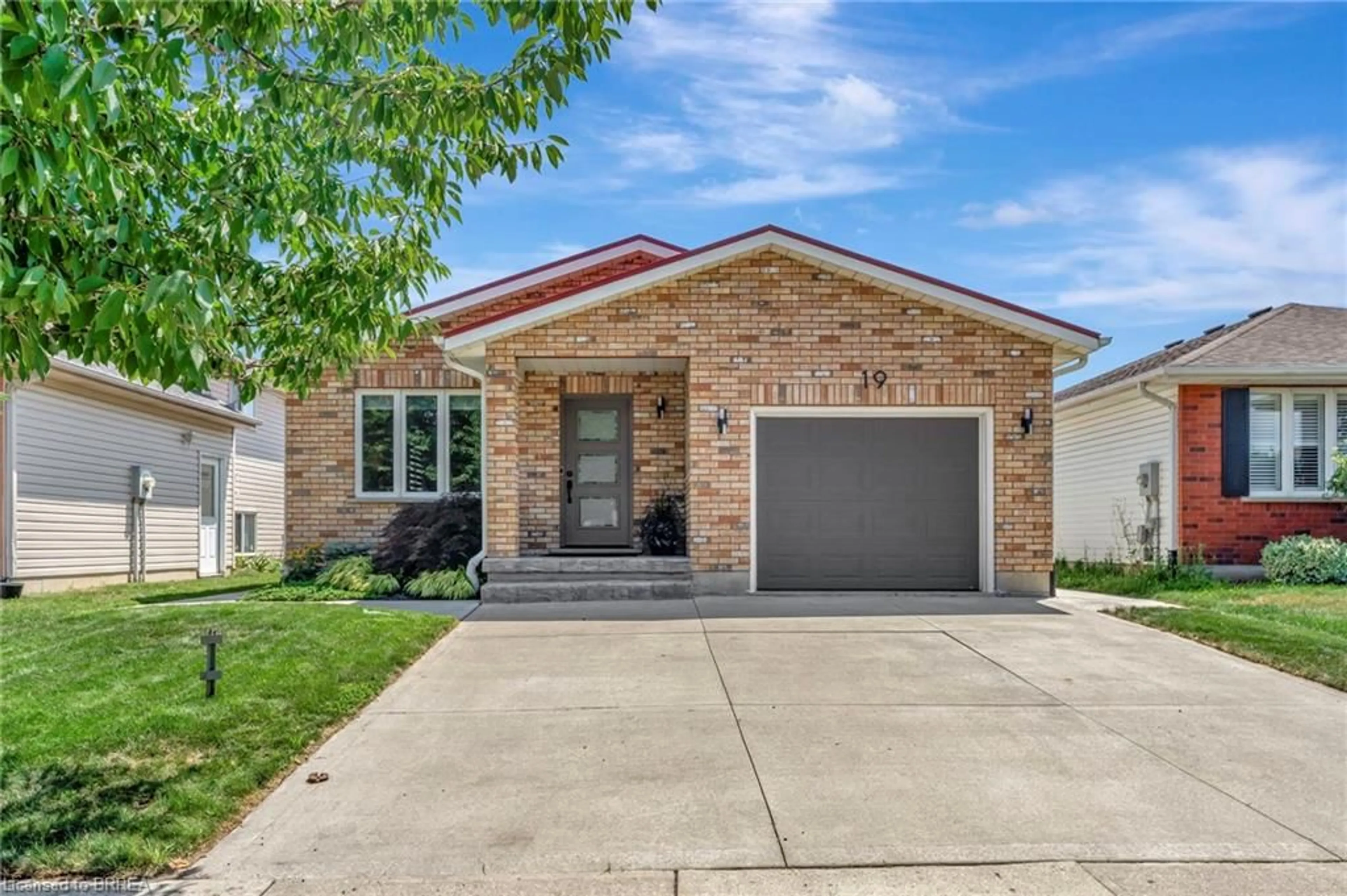 Home with brick exterior material, street for 19 Limerick Lane, Brantford Ontario N3T 6L3