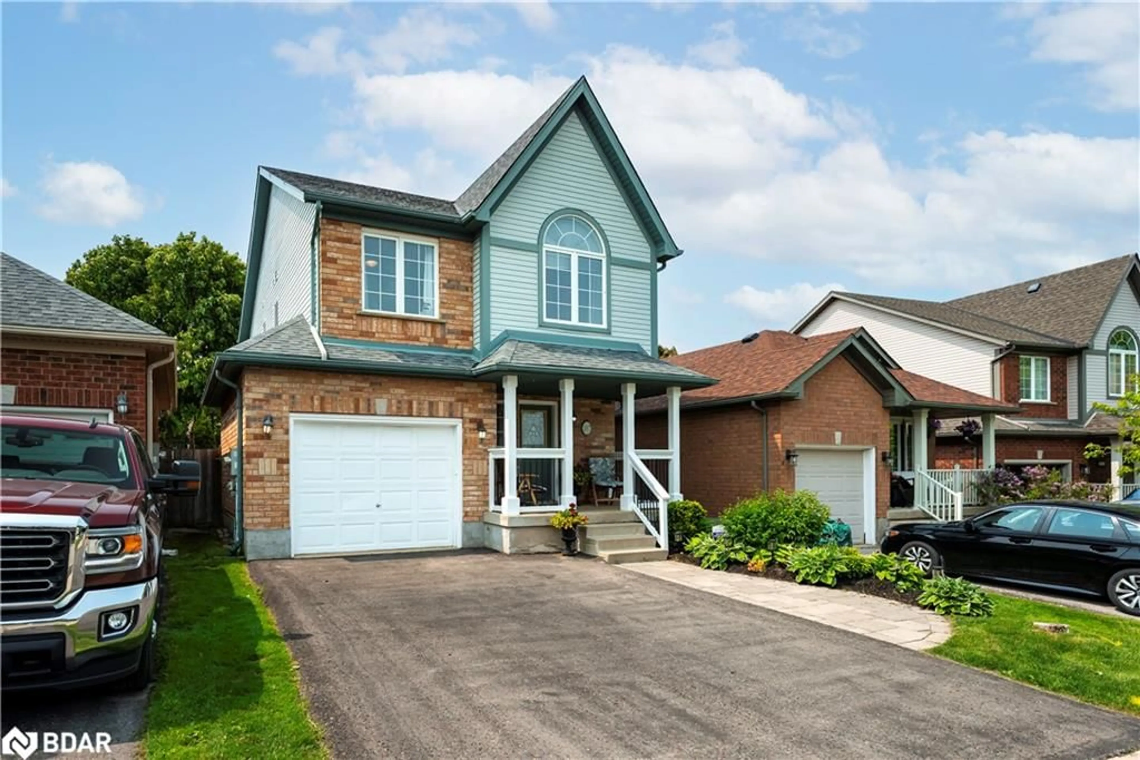 Home with brick exterior material, street for 107 Glengarry Rd, Orangeville Ontario L9W 5E4