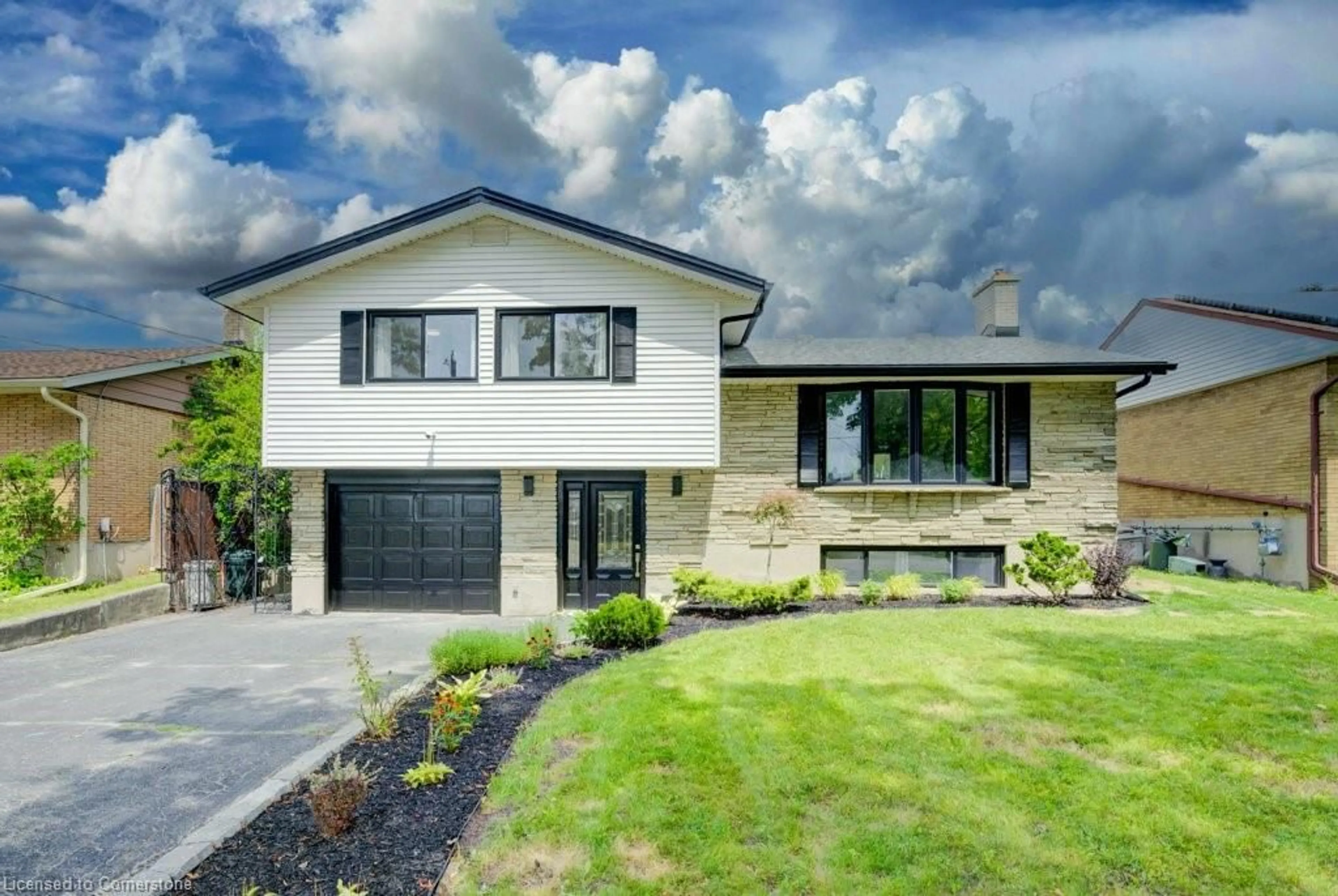 Home with brick exterior material, street for 16 Elkington Dr, Kitchener Ontario N2B 1S2