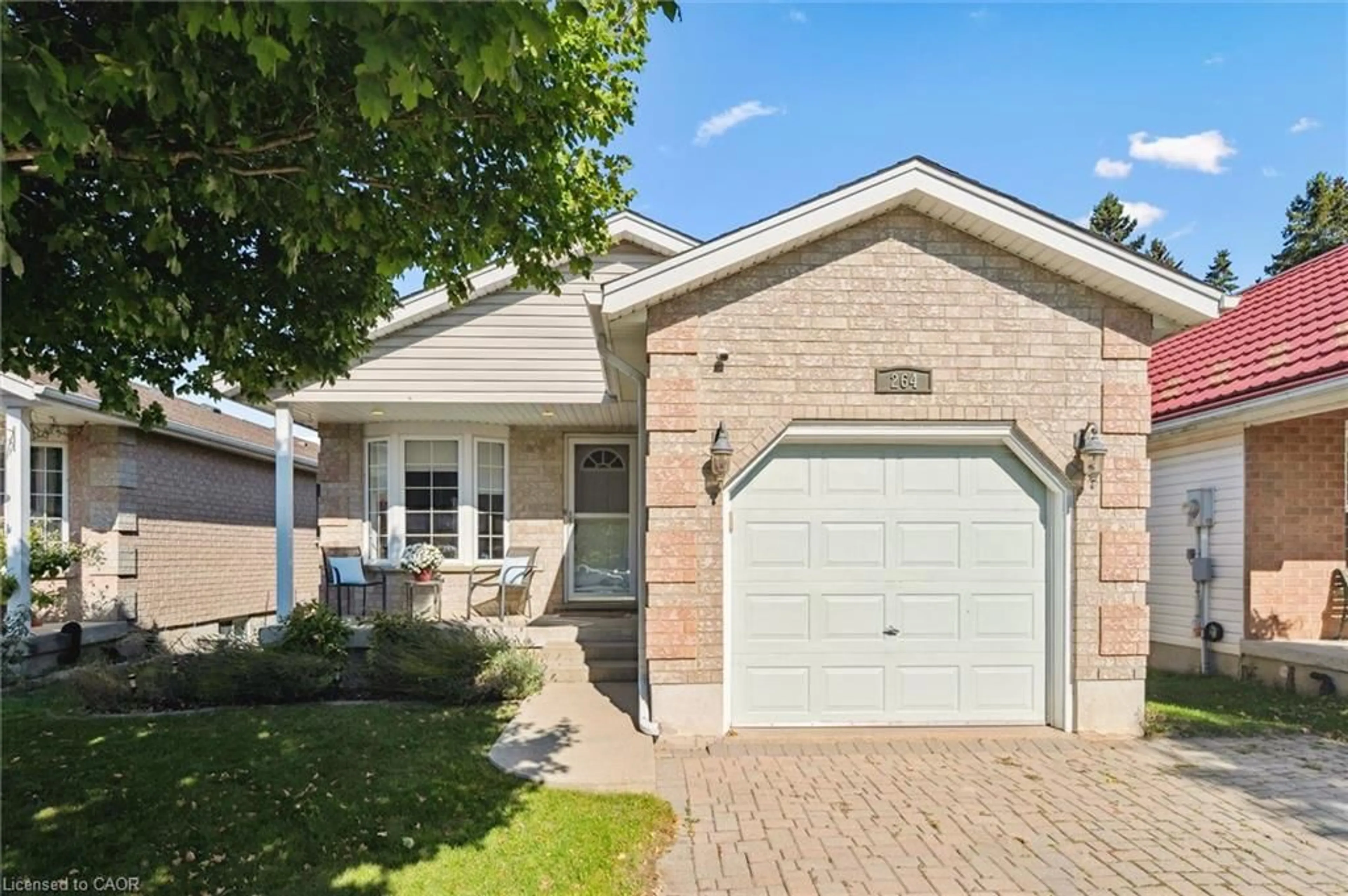 Home with brick exterior material, street for 264 Grey Fox Dr, Kitchener Ontario N2E 3P2