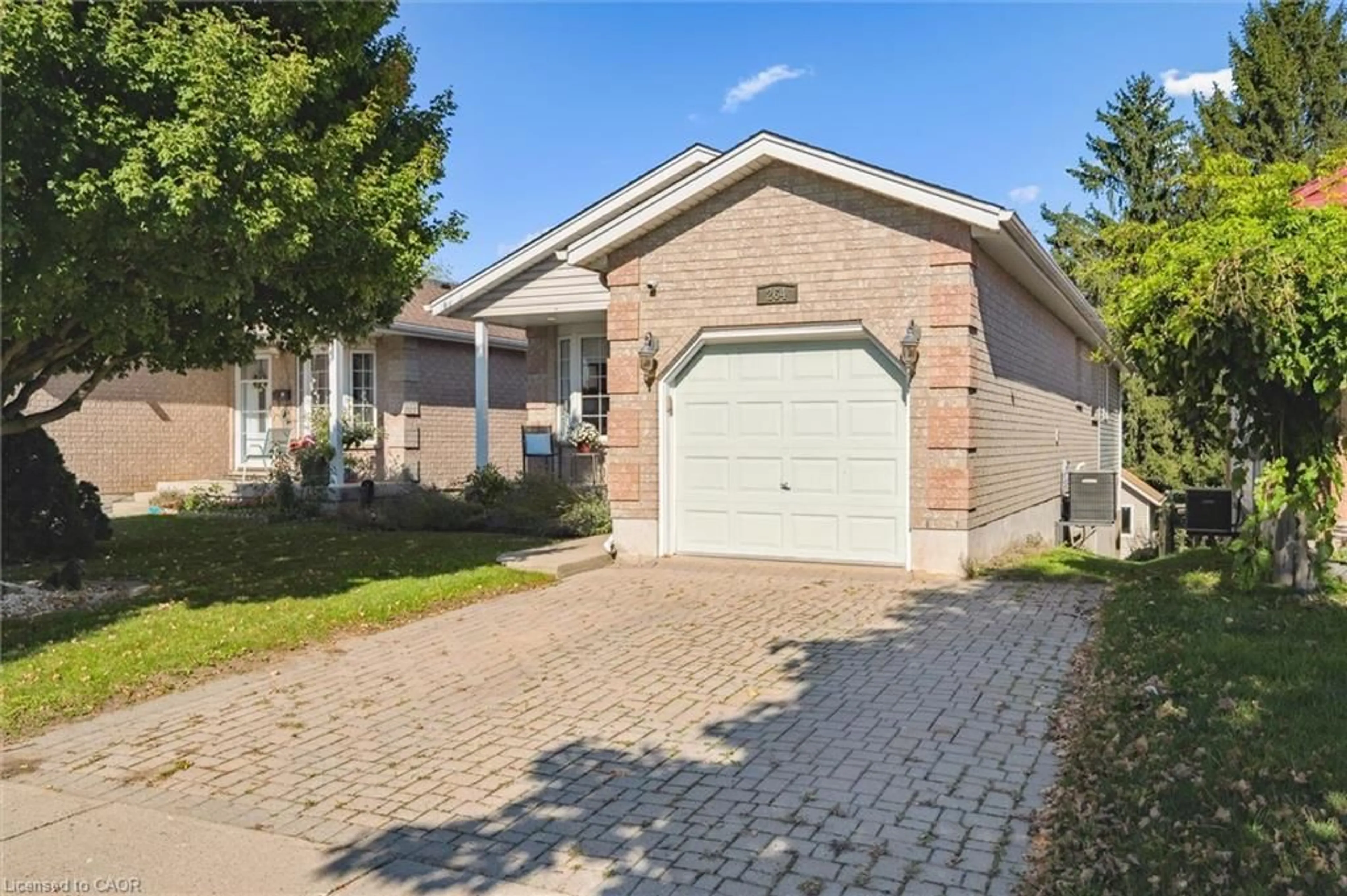 Home with brick exterior material, street for 264 Grey Fox Dr, Kitchener Ontario N2E 3P2