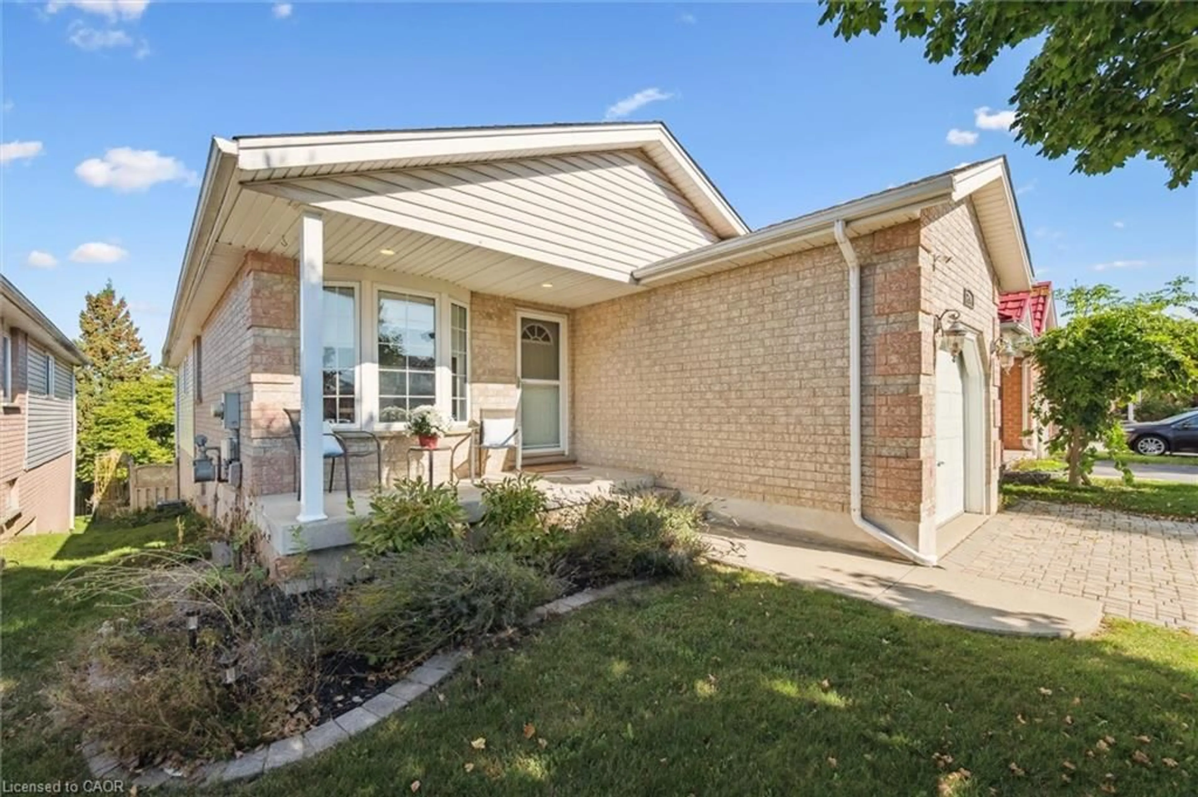 Home with brick exterior material, street for 264 Grey Fox Dr, Kitchener Ontario N2E 3P2
