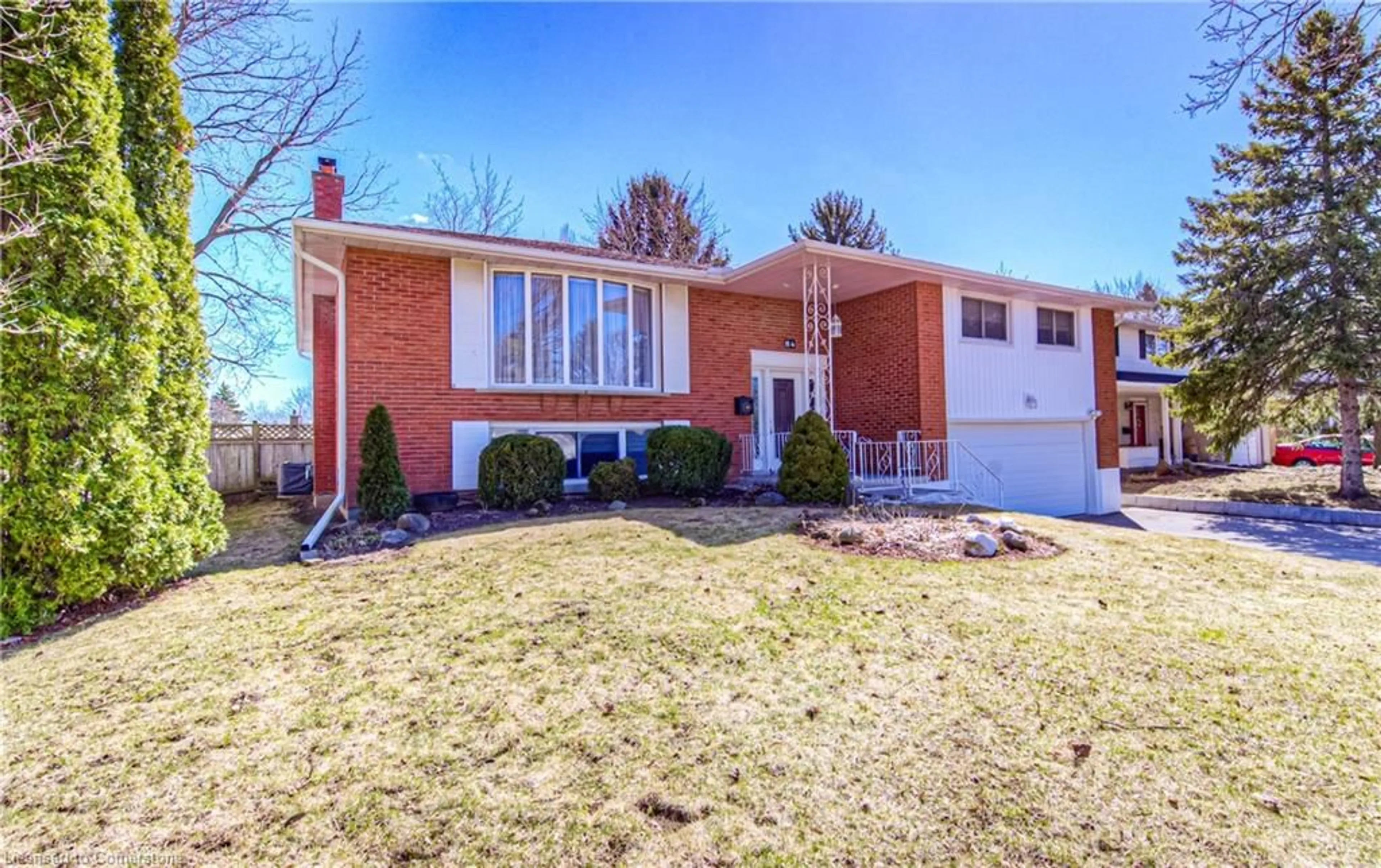 Home with brick exterior material, street for 84 Ridgeview Cres, Waterloo Ontario N2L 2P9