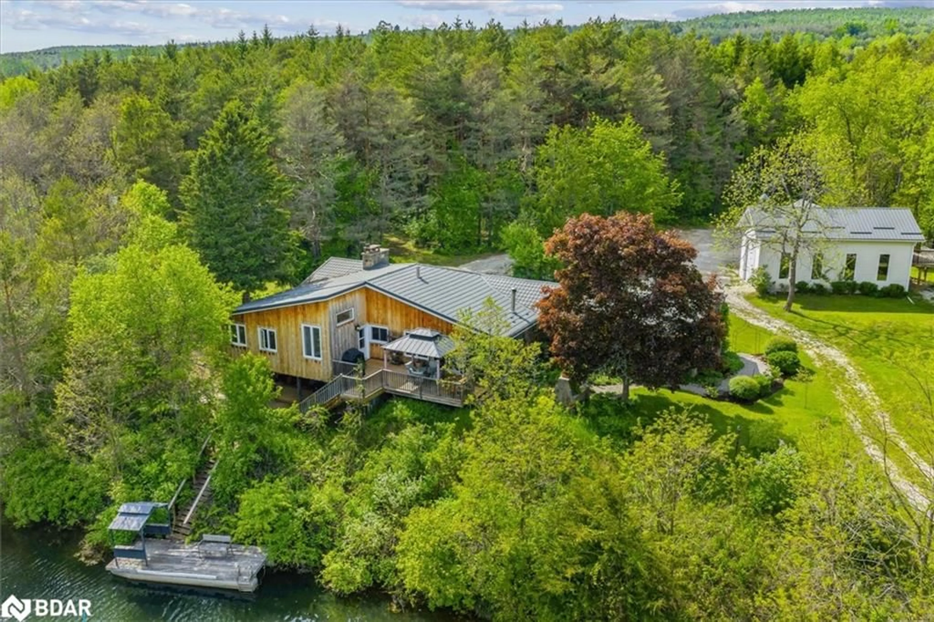A pic from outside/outdoor area/front of a property/back of a property/a pic from drone, water/lake/river/ocean view for 798213 3rd St, Mulmur Ontario L9V 0H7