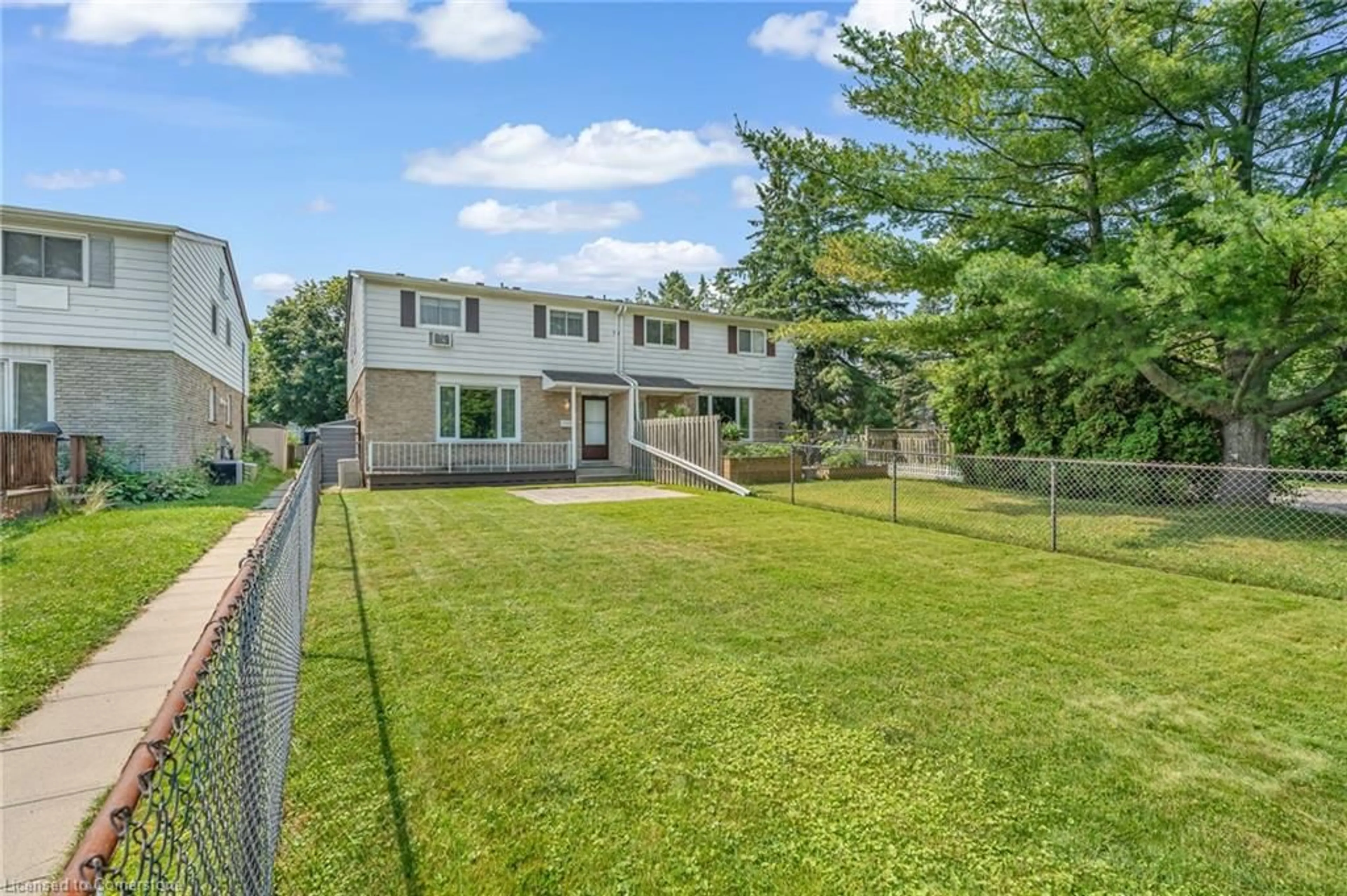 A pic from outside/outdoor area/front of a property/back of a property/a pic from drone, street for 30 Oakhill Dr #A, Brantford Ontario N3T 1R1