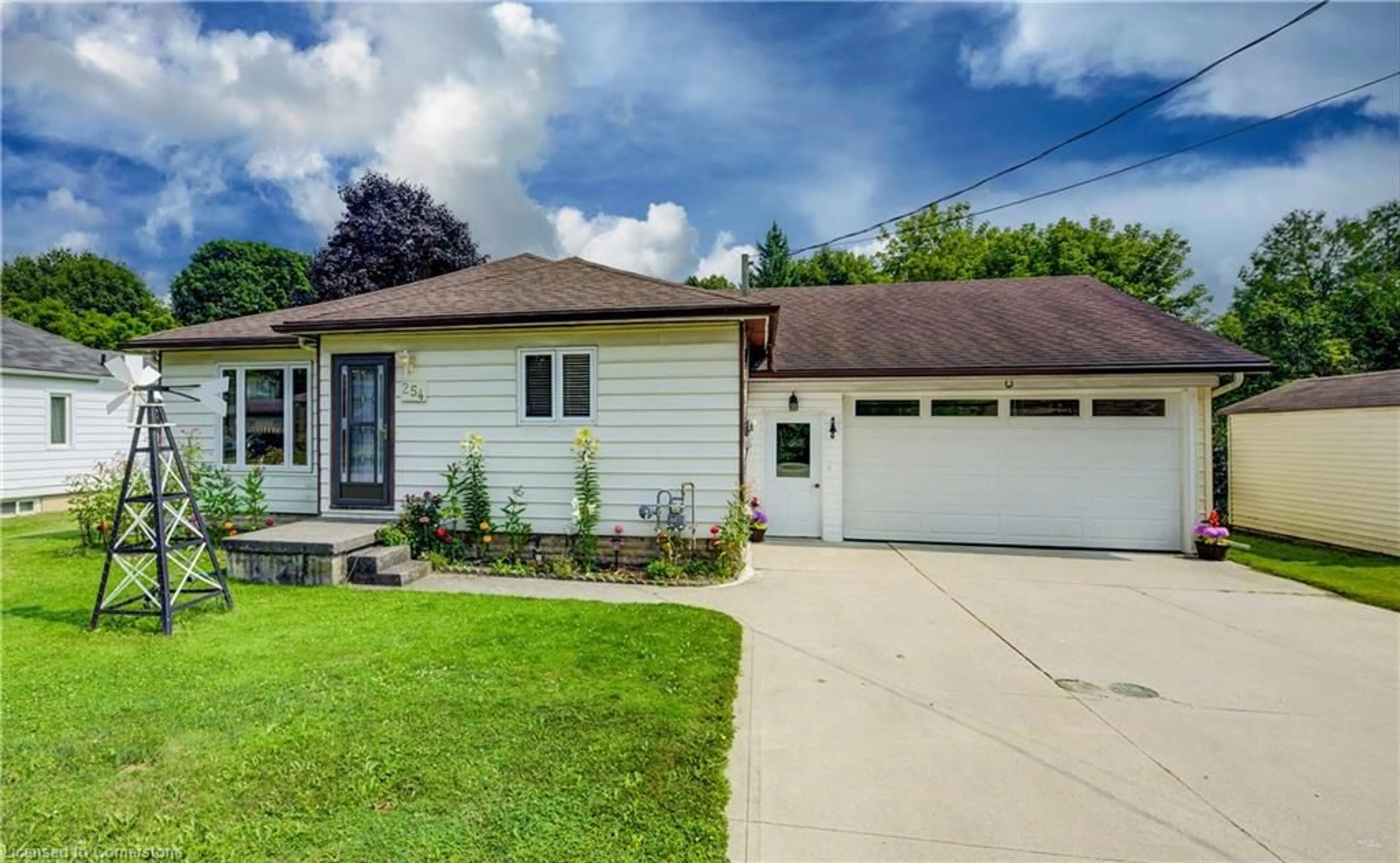 Home with vinyl exterior material, street for 254 Wellington St, Mount Forest Ontario N0G 2L0