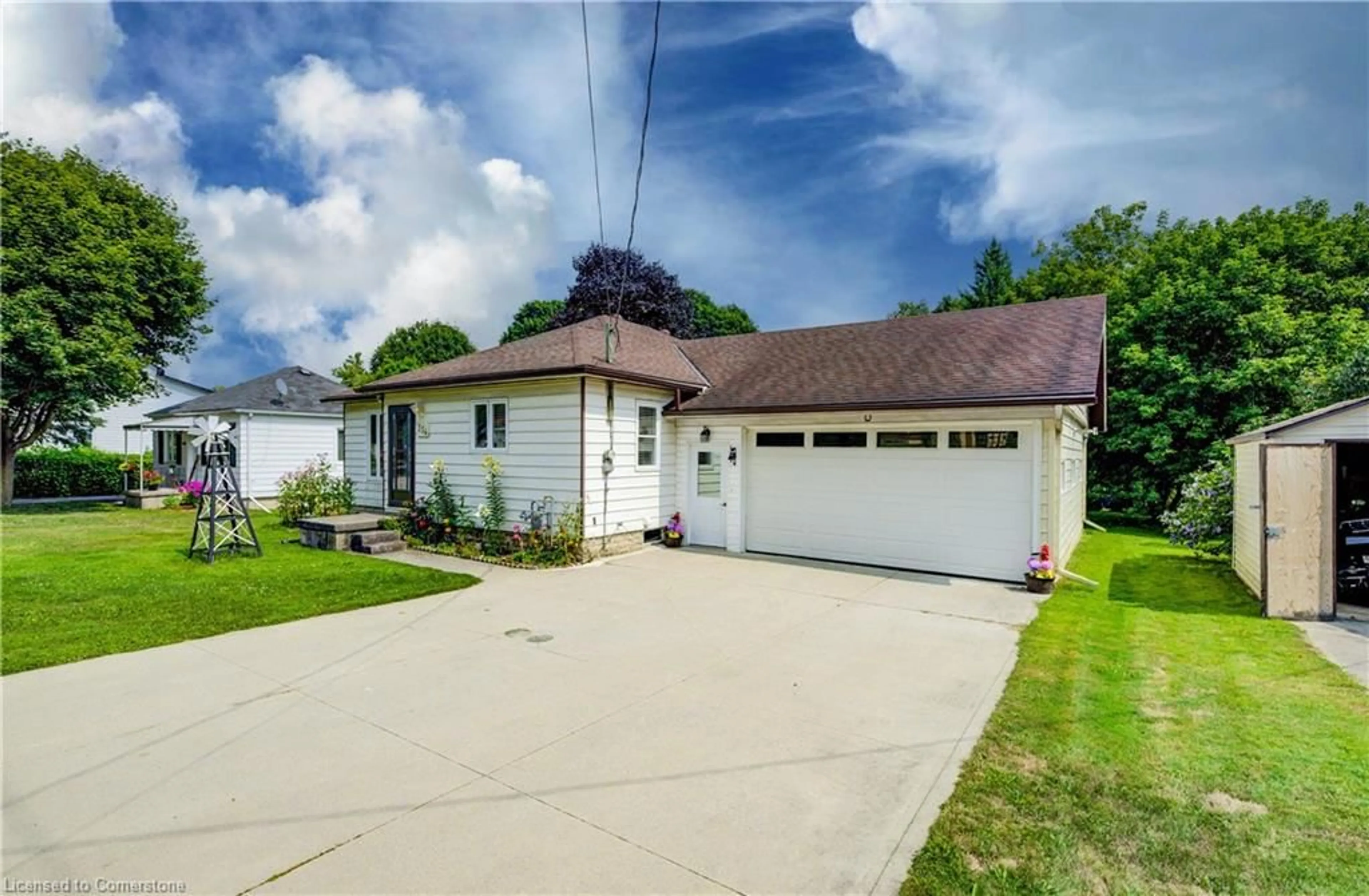 A pic from outside/outdoor area/front of a property/back of a property/a pic from drone, street for 254 Wellington St, Mount Forest Ontario N0G 2L0