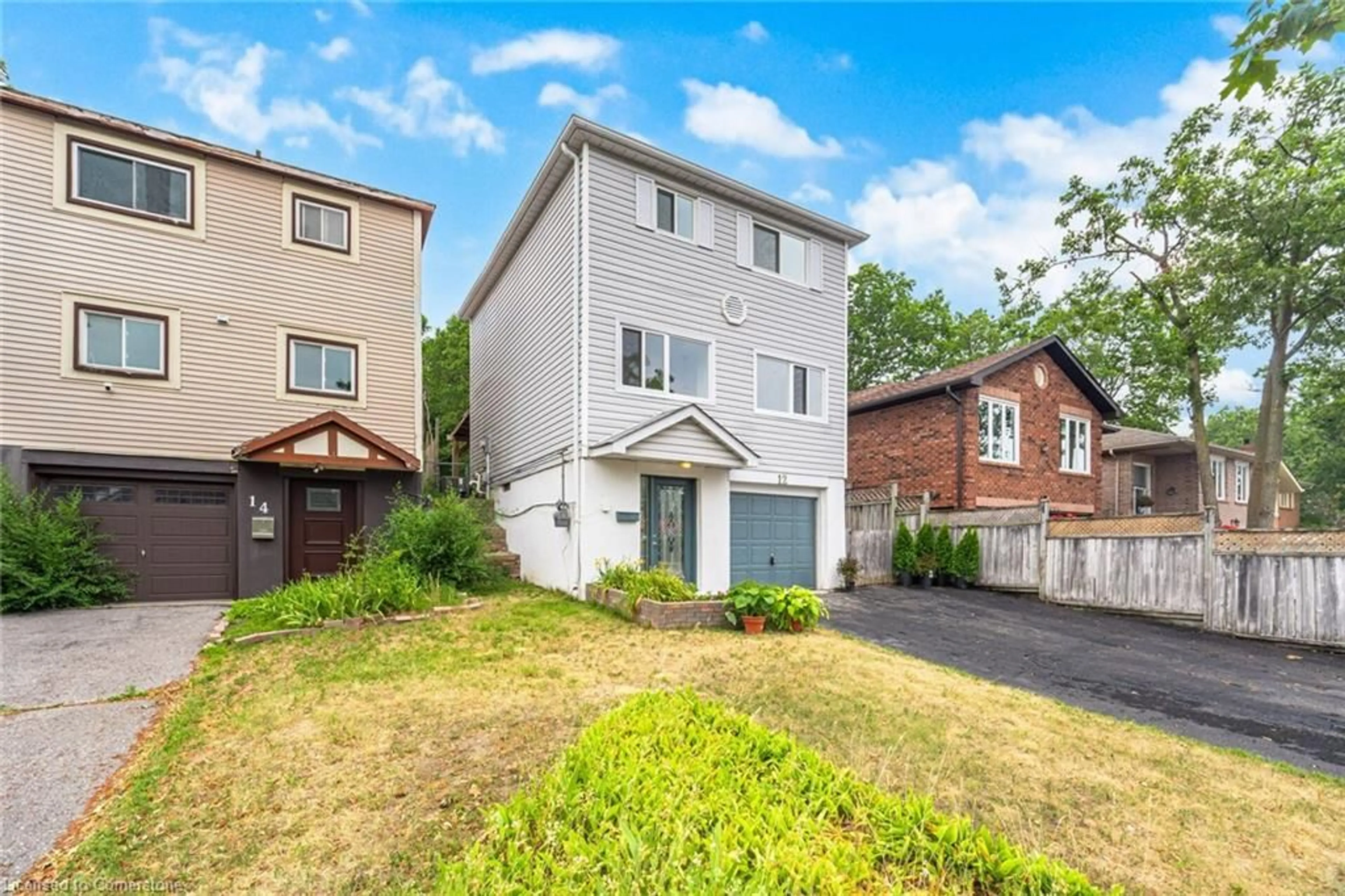 Home with brick exterior material, street for 12 Browning Trail, Barrie Ontario L4N 4Z4