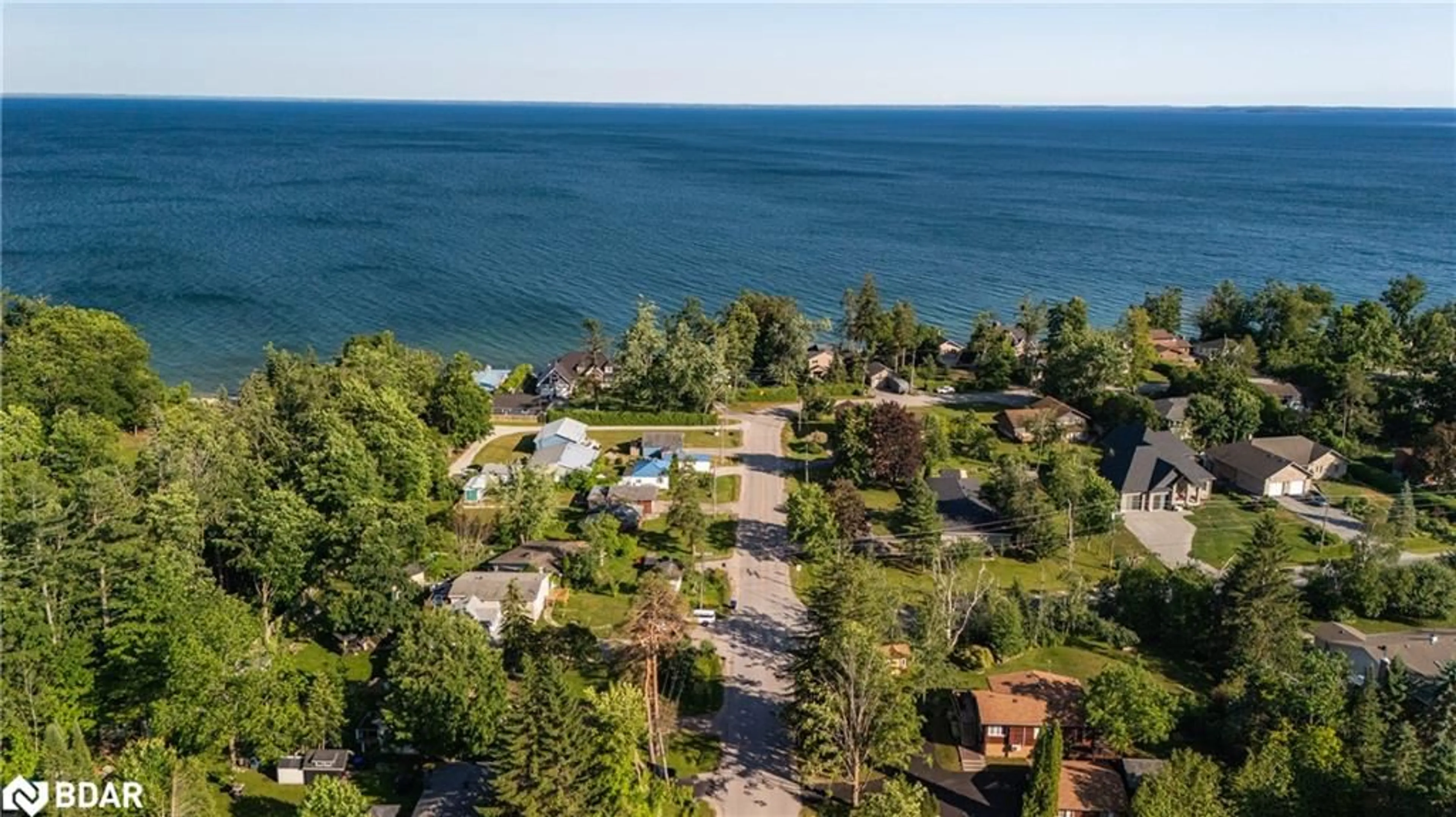 A pic from outside/outdoor area/front of a property/back of a property/a pic from drone, water/lake/river/ocean view for 47 Lakeshore Rd, Oro-Medonte Ontario L0L 2E0