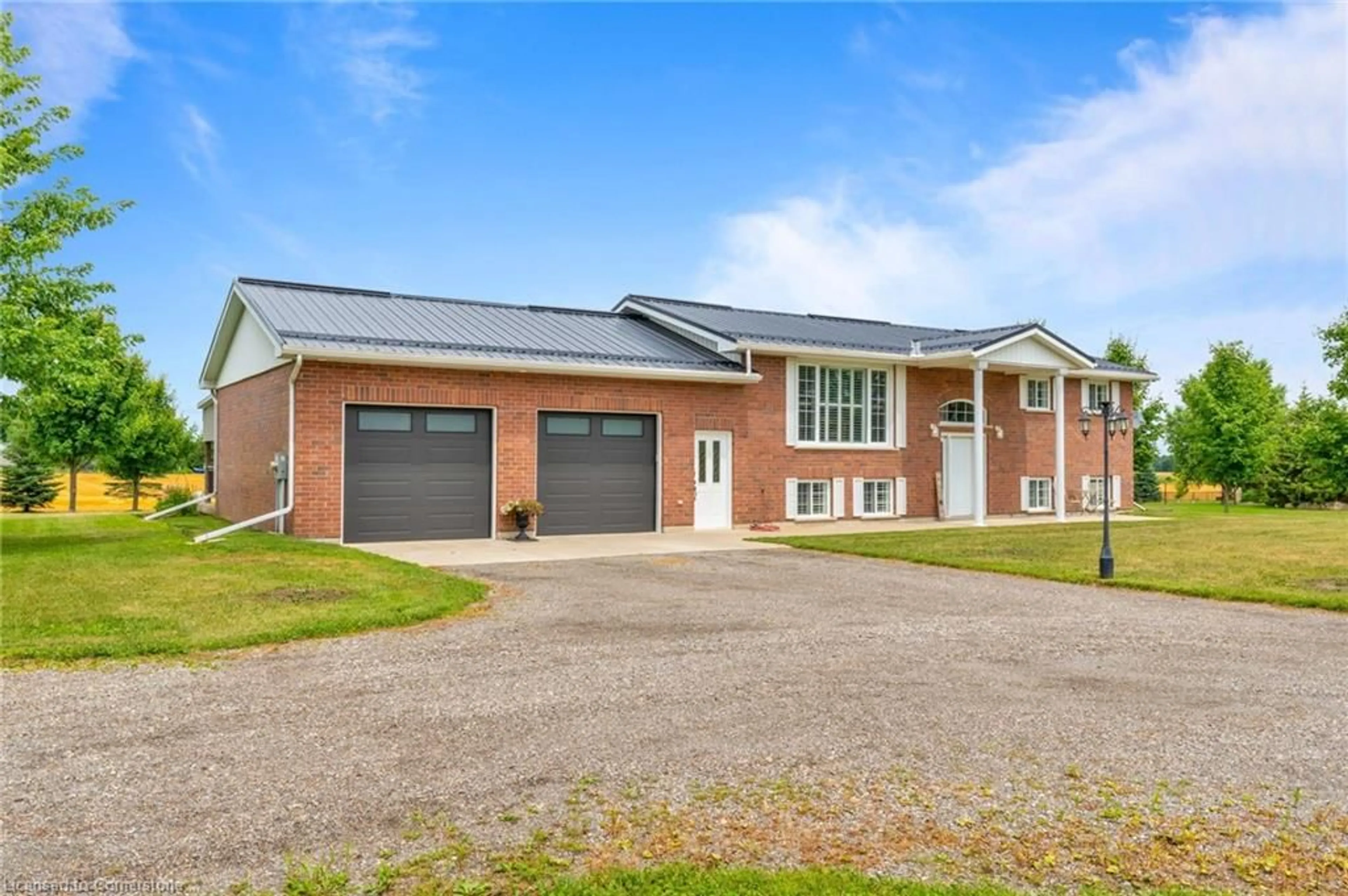 Home with brick exterior material, building for 991 Norfolk County Rd 19, Wilsonville Ontario N0E 1Z0