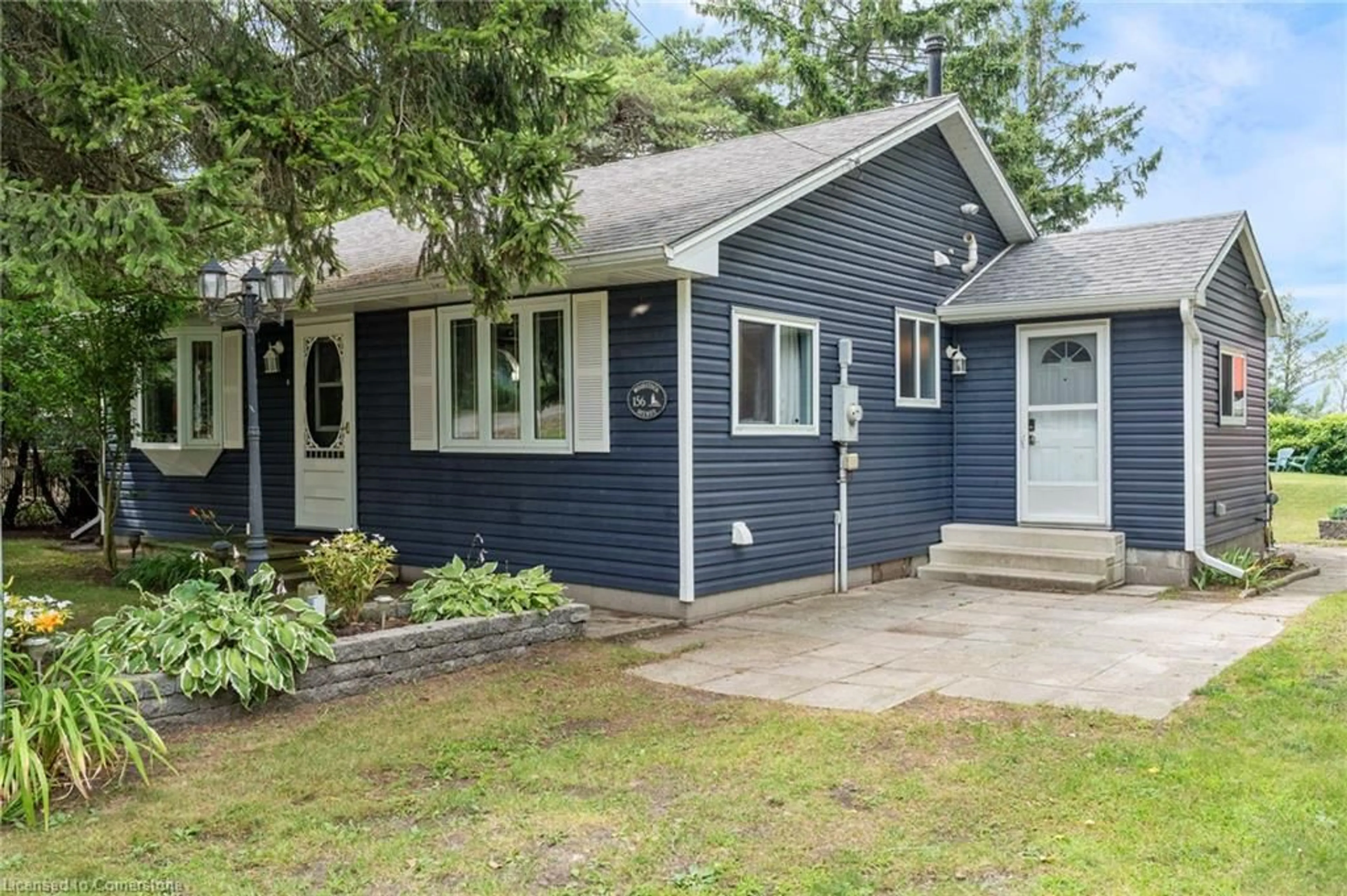 Home with vinyl exterior material, street for 156 Woodstock Ave, Long Point Ontario N0E 1M0