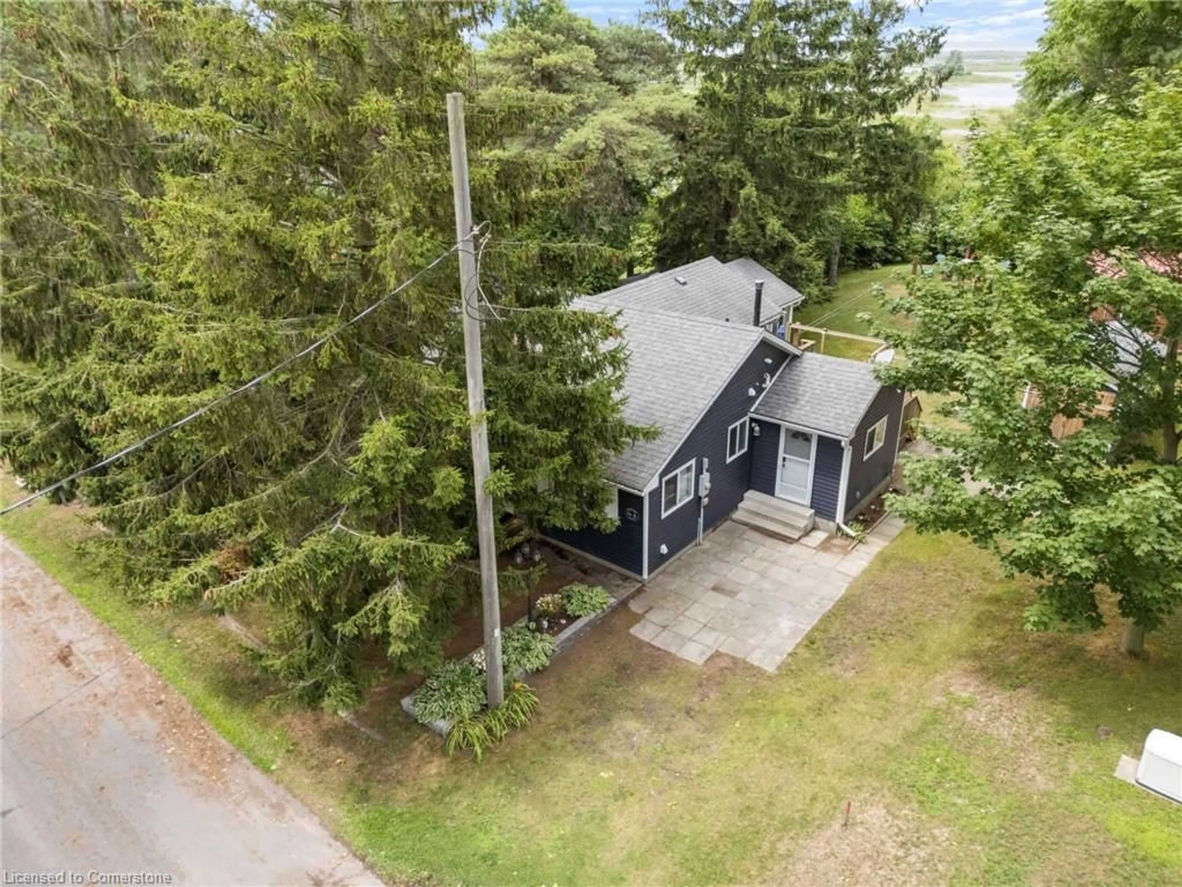 A pic from outside/outdoor area/front of a property/back of a property/a pic from drone, street for 156 Woodstock Ave, Long Point Ontario N0E 1M0