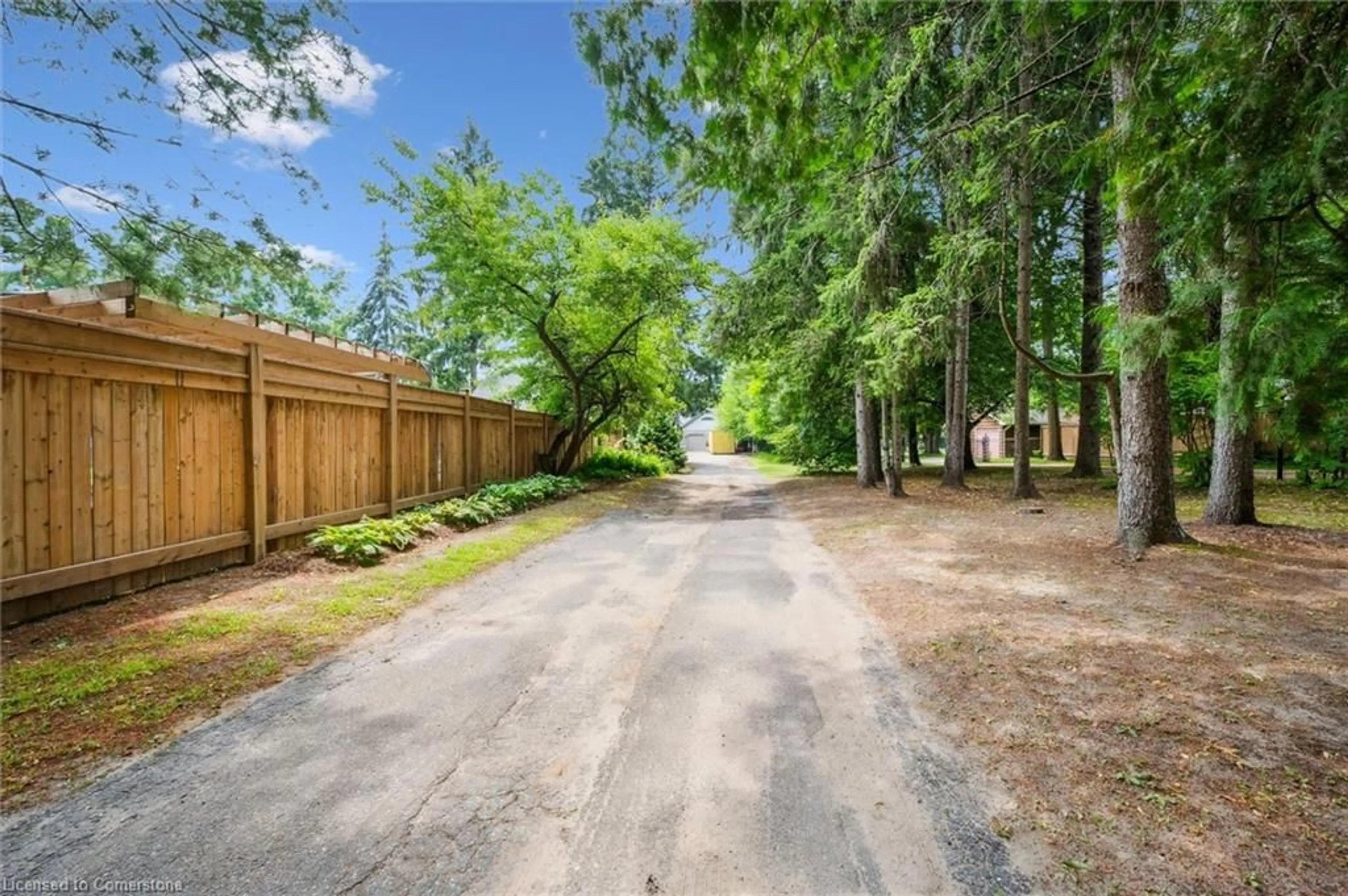 Patio, forest/trees view for 91 Limerick Dr, Kitchener Ontario N2P 2G9