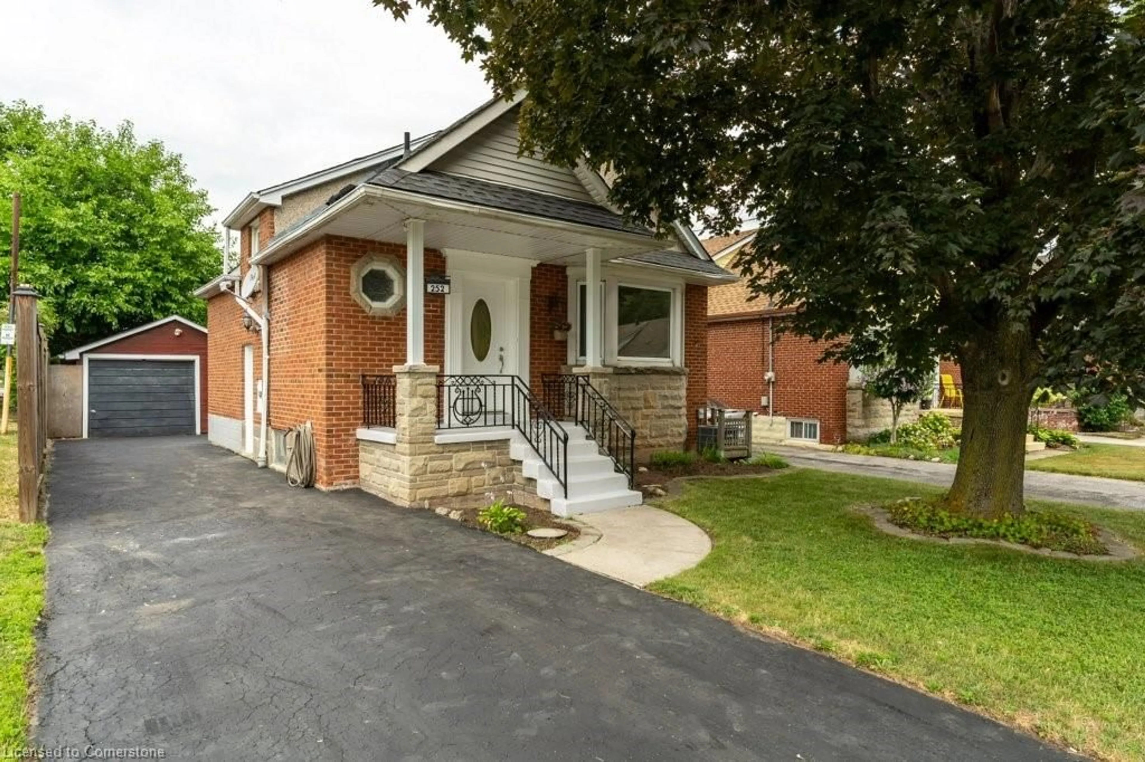 Home with brick exterior material, street for 252 Glencairn Ave, Hamilton Ontario L8K 3P2
