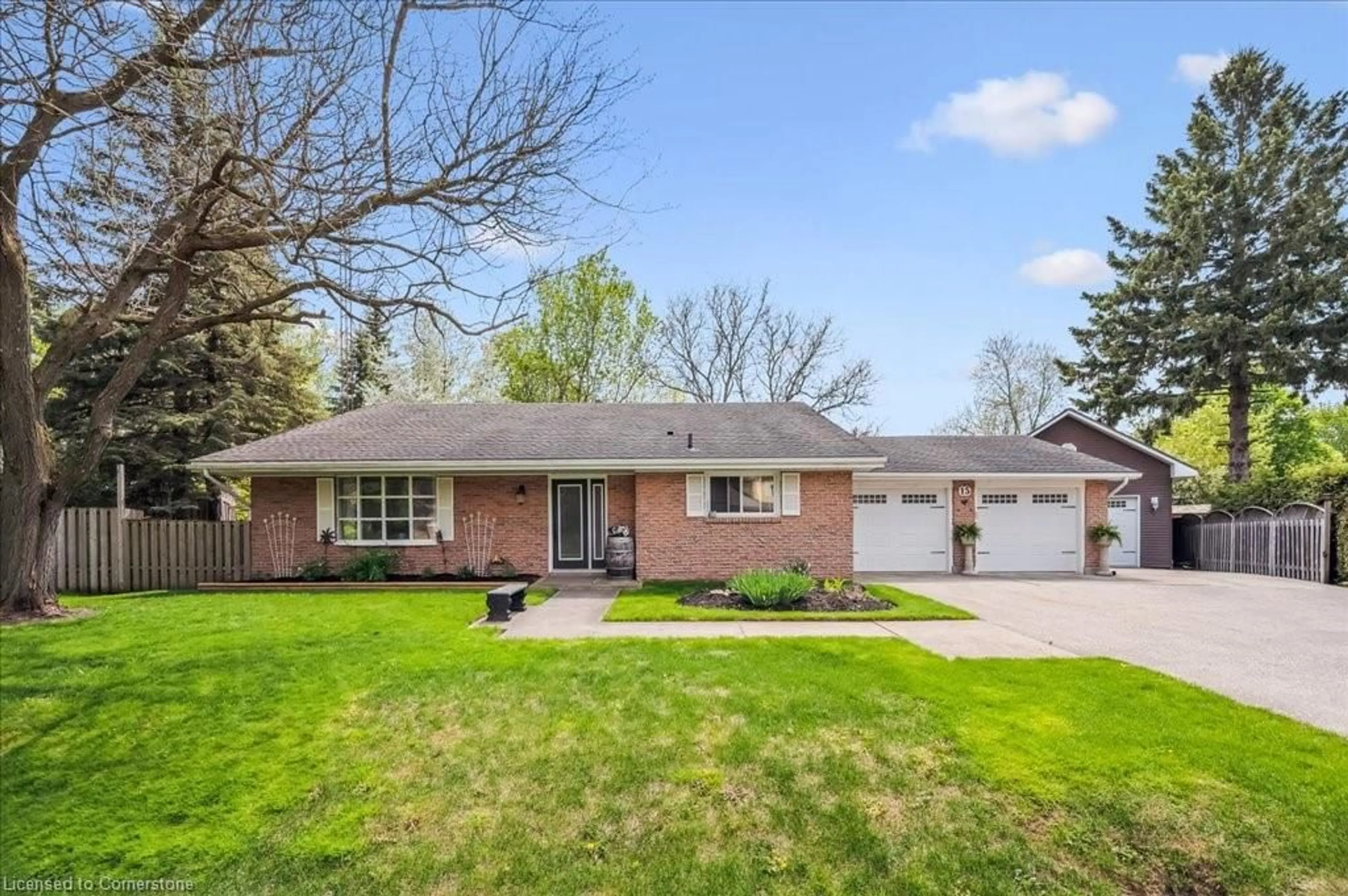 Home with brick exterior material, street for 15 Wellington Dr, Elora Ontario N0B 1S0