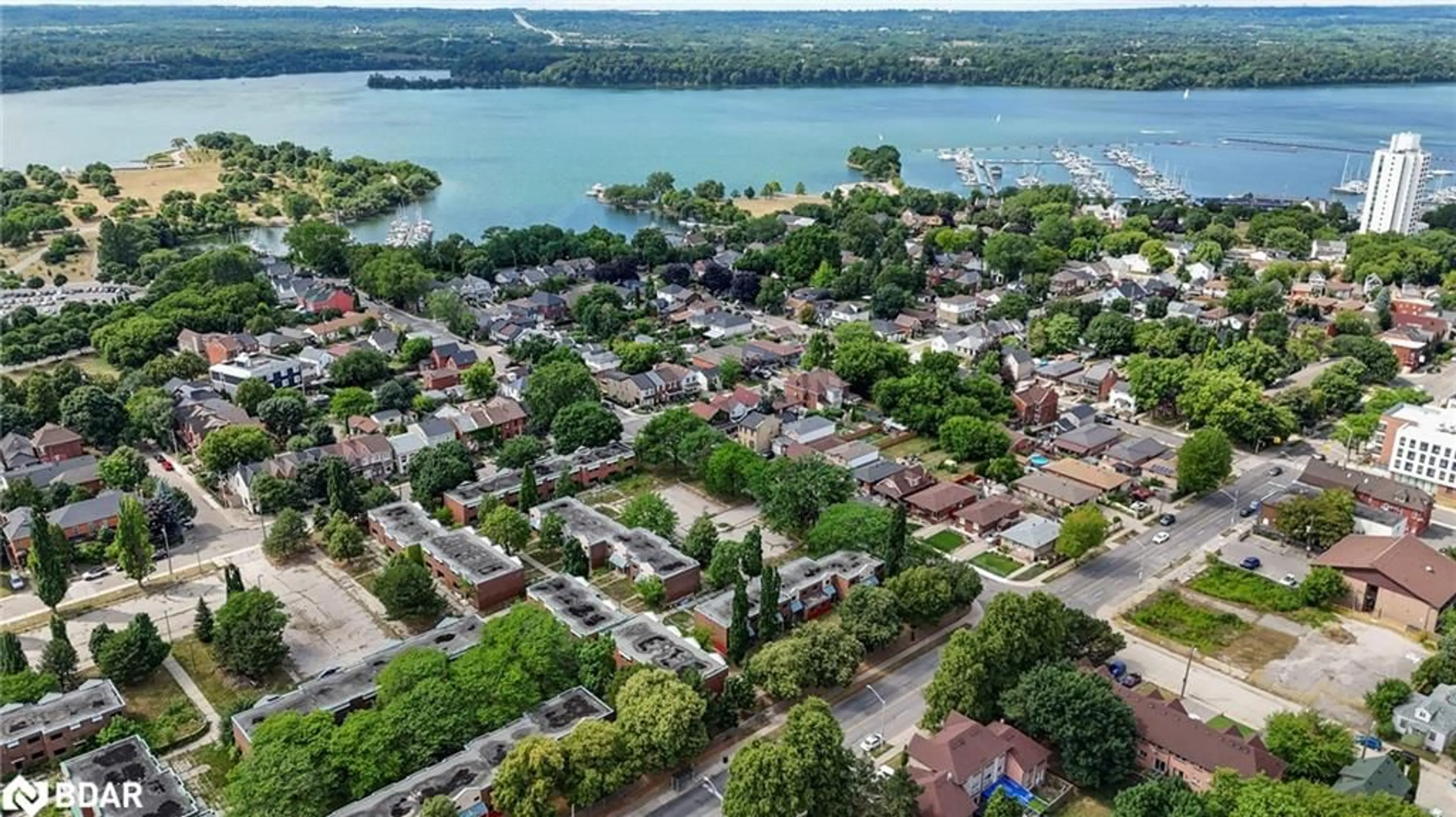 A pic from outside/outdoor area/front of a property/back of a property/a pic from drone, water/lake/river/ocean view for 380 Macnab St, Hamilton Ontario L8L 1L1