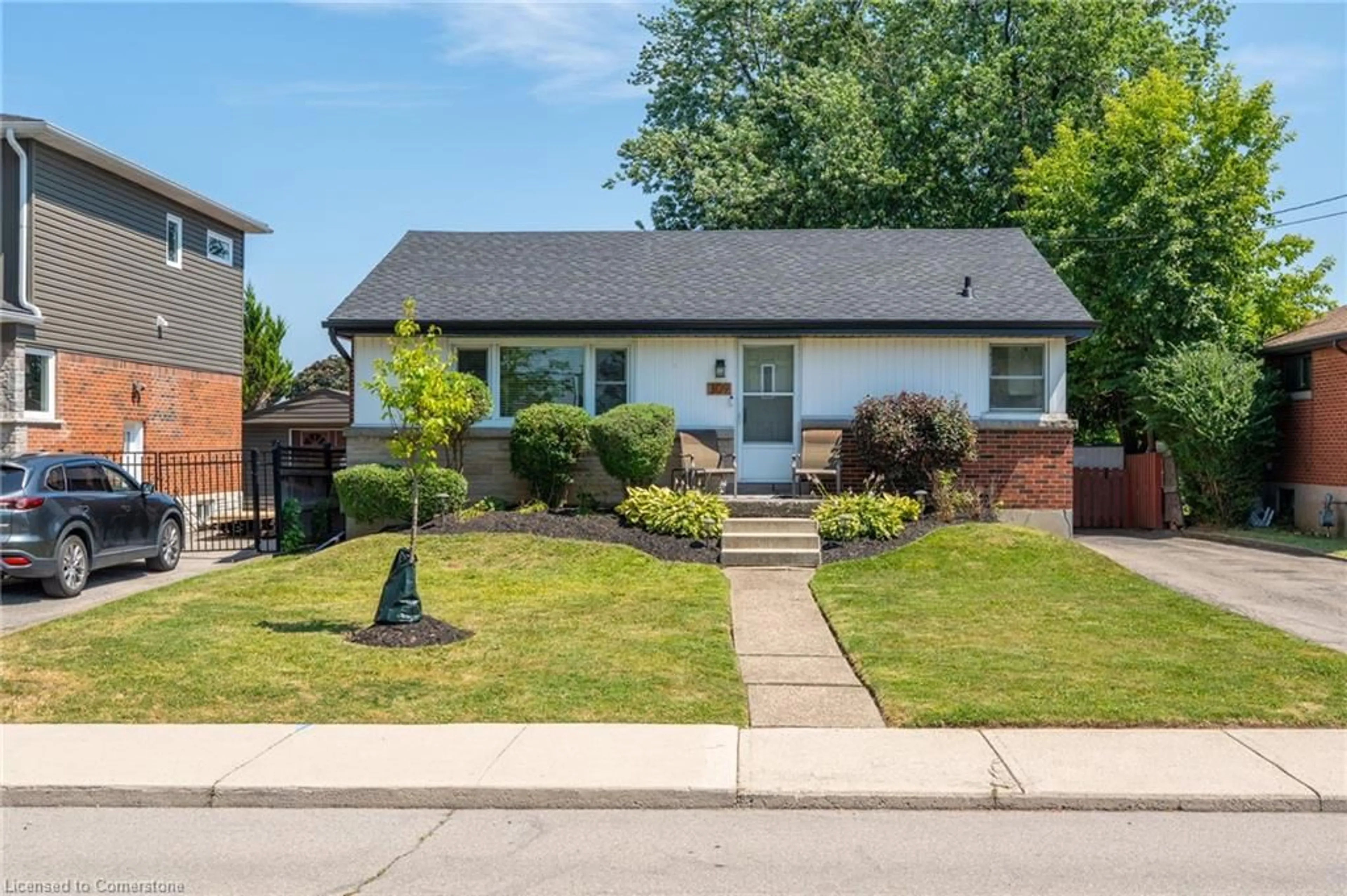 Home with brick exterior material, street for 309 East 45th St, Hamilton Ontario L8T 3K7