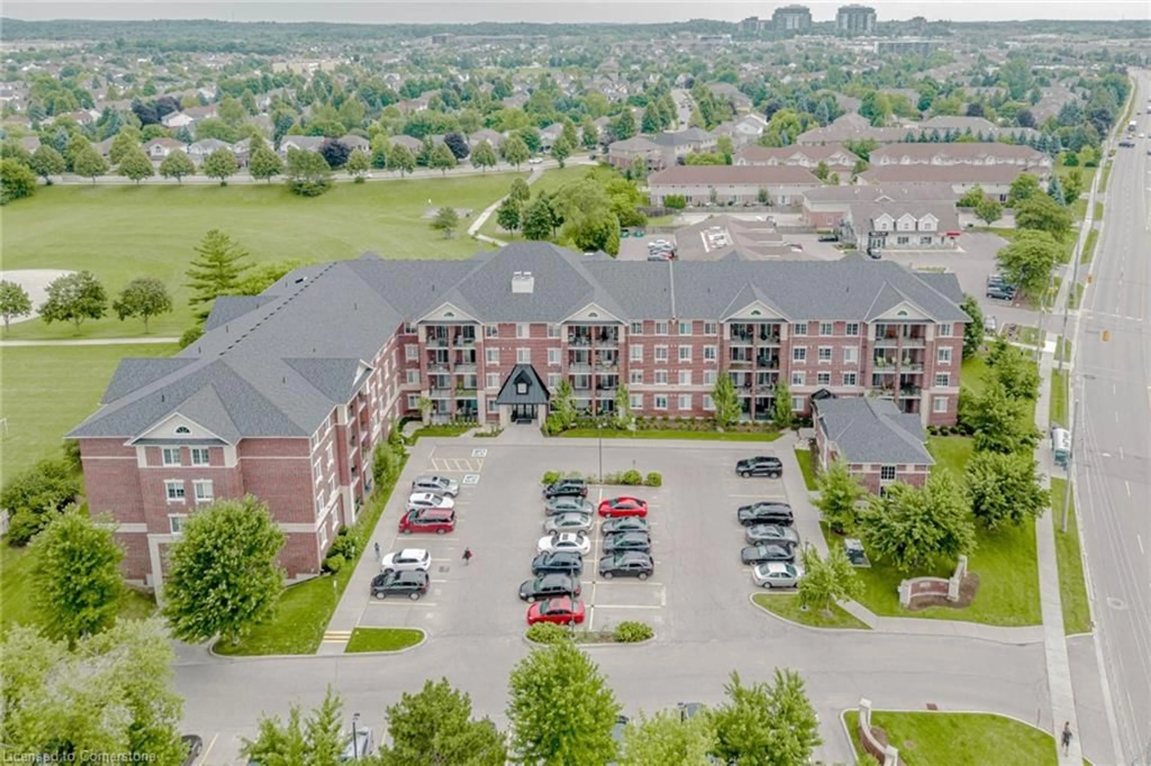A pic from outside/outdoor area/front of a property/back of a property/a pic from drone, city buildings view from balcony for 1440 Gordon Street St #419, Guelph Ontario N1L 1C8