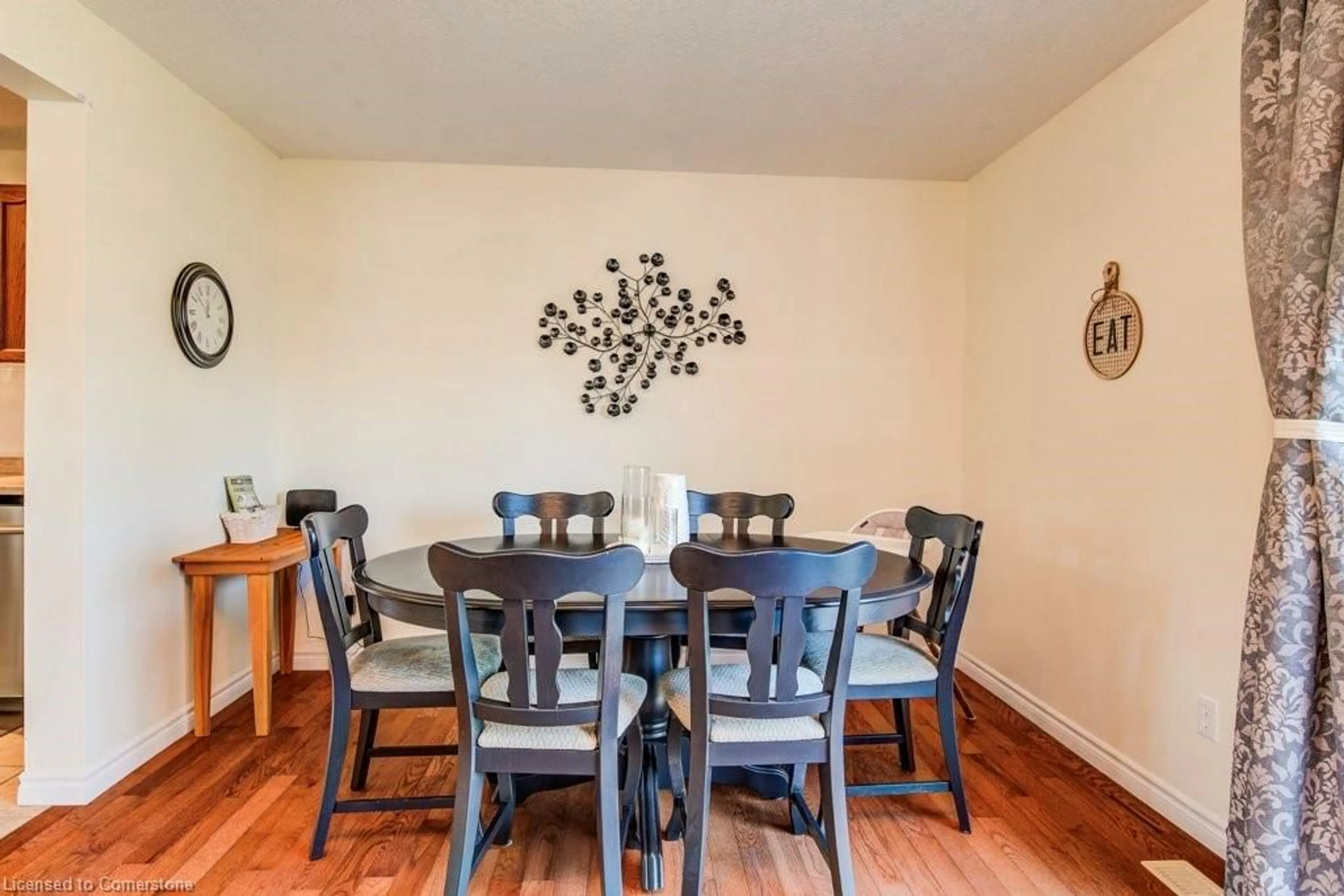 Dining room, wood/laminate floor for 457 Danby St, Listowel Ontario N4W 0A5