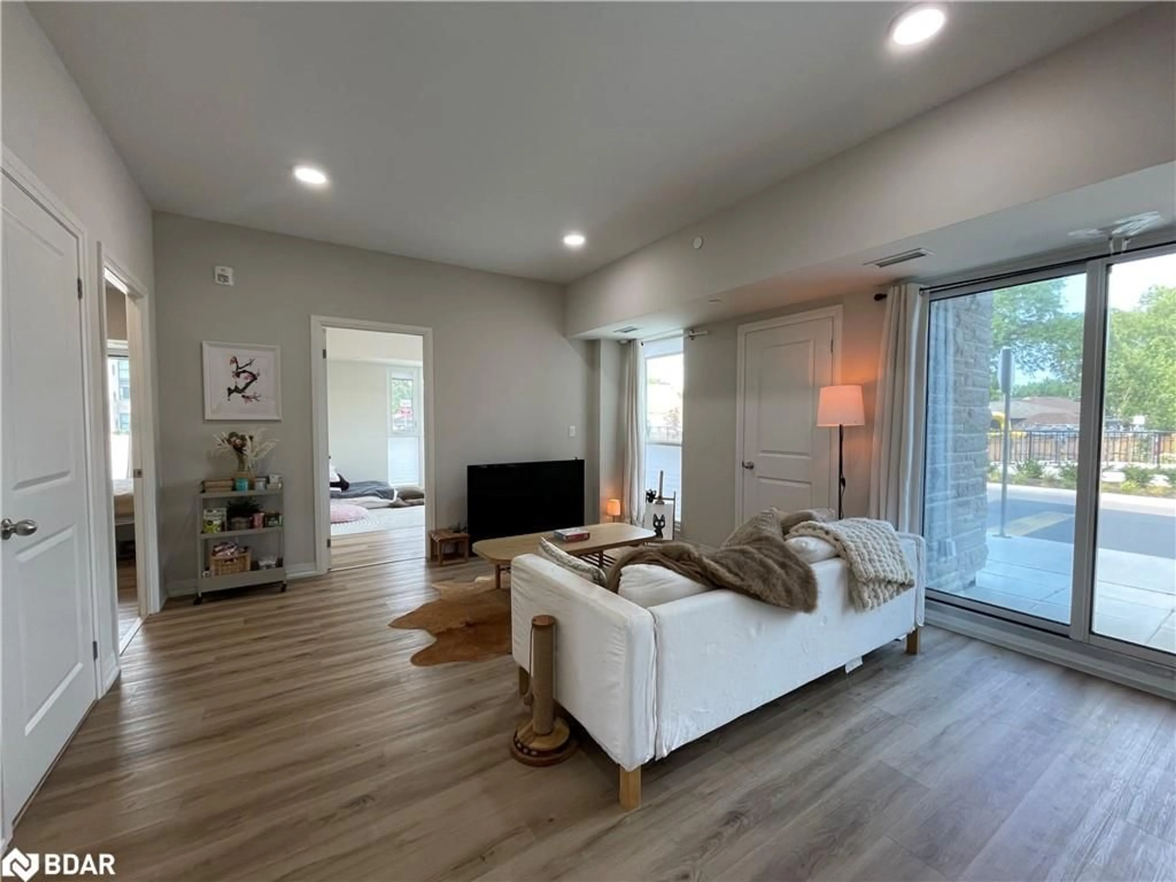 Living room with furniture, unknown for 50 Herrick Ave #115, St. Catharines Ontario L2P 2T9
