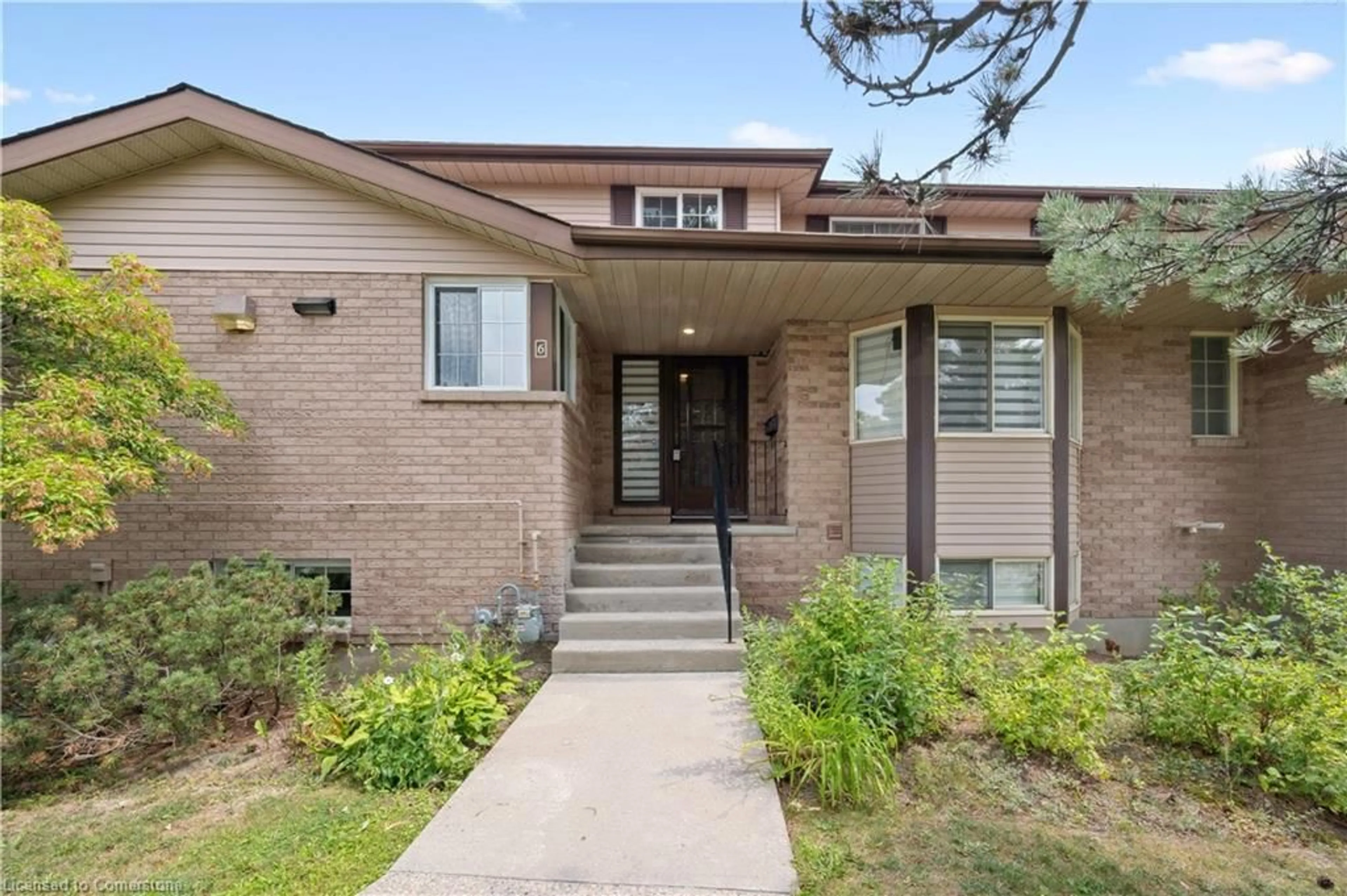 Home with brick exterior material, street for 456 Beechwood Pl #6, Waterloo Ontario N2T 1N5