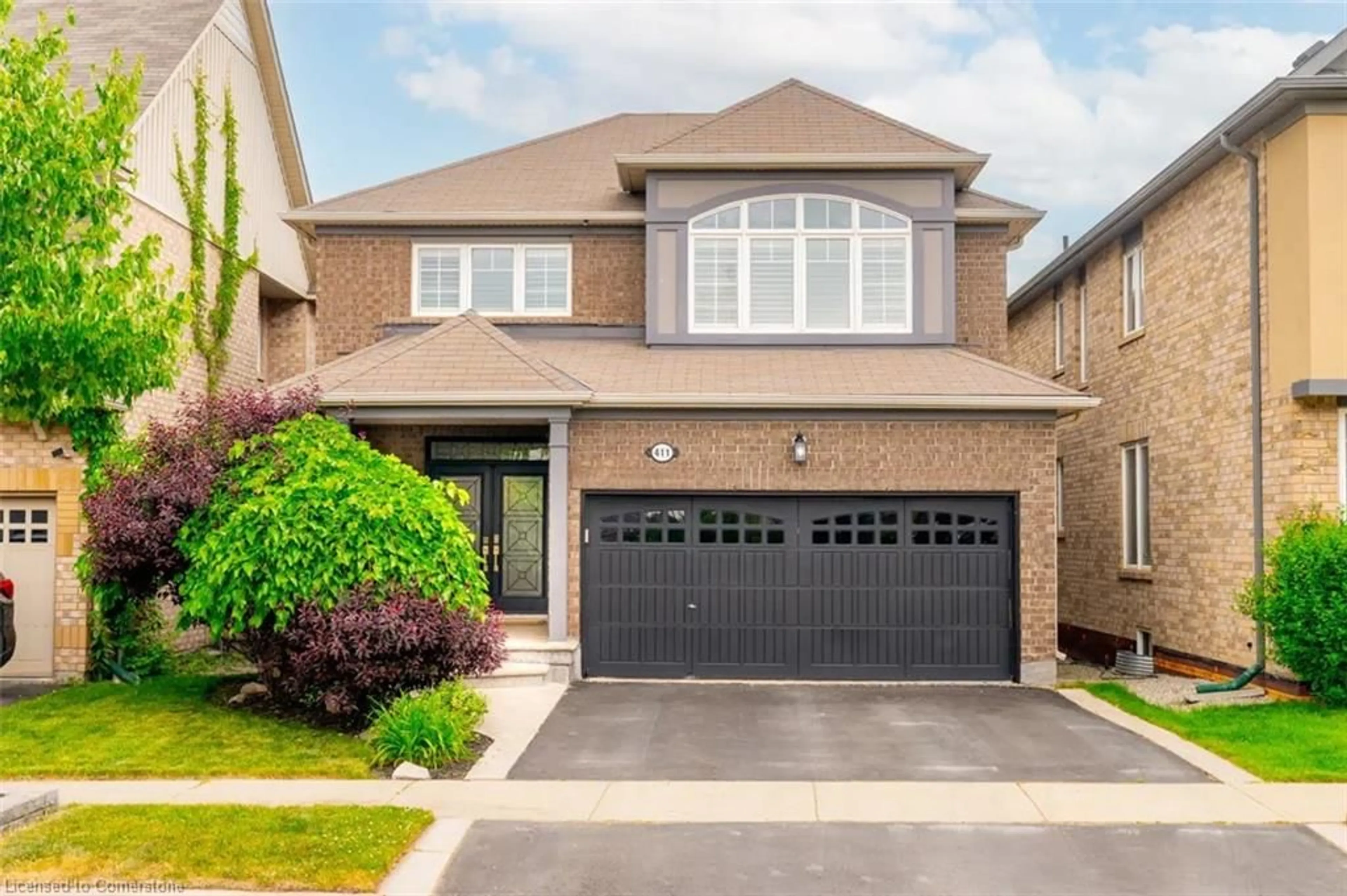 Home with brick exterior material, street for 411 Mcjannett Ave, Milton Ontario L9T 7T8