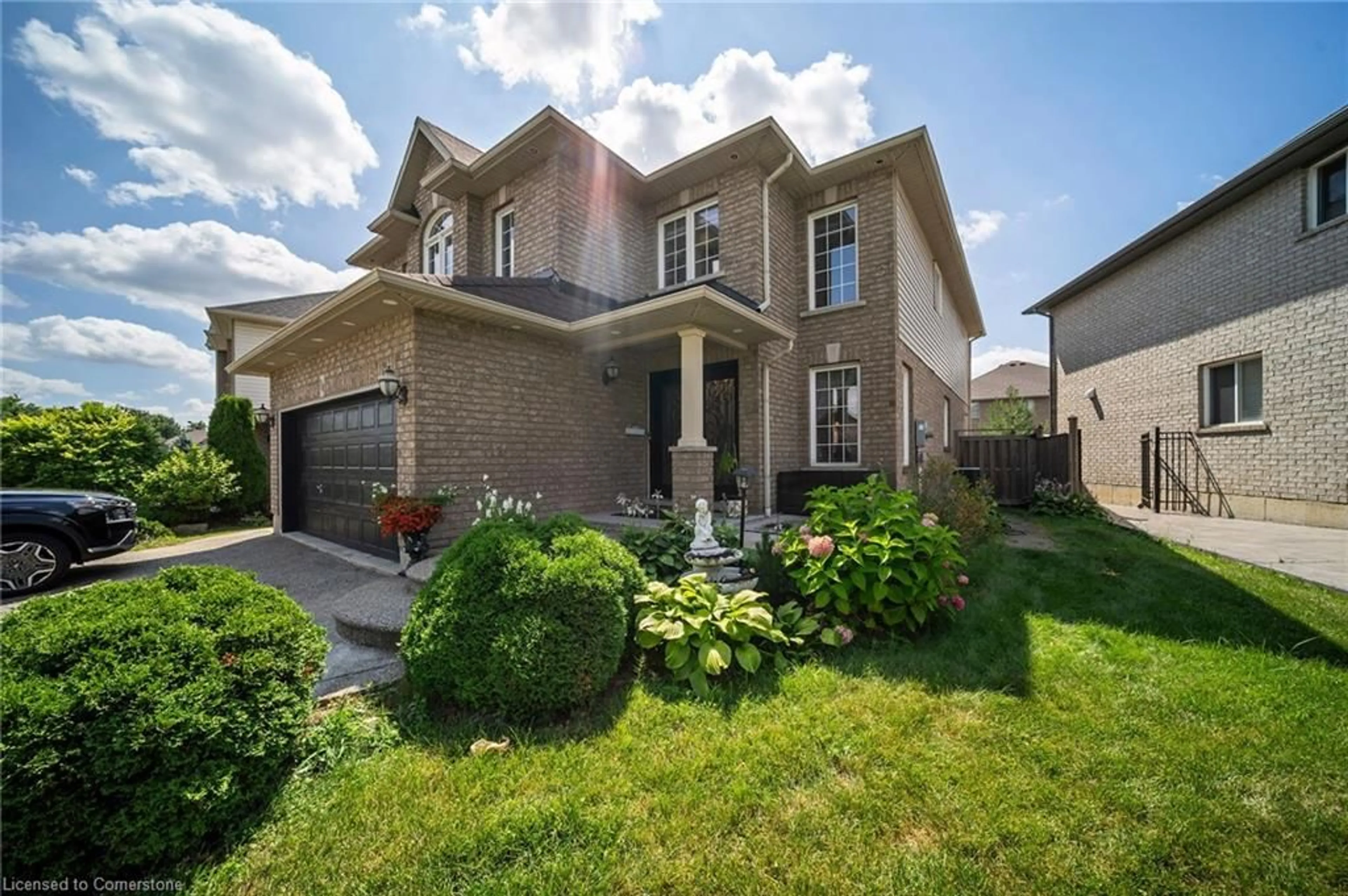 Home with brick exterior material, street for 70 Fortissimo Dr, Hamilton Ontario L9C 0B8