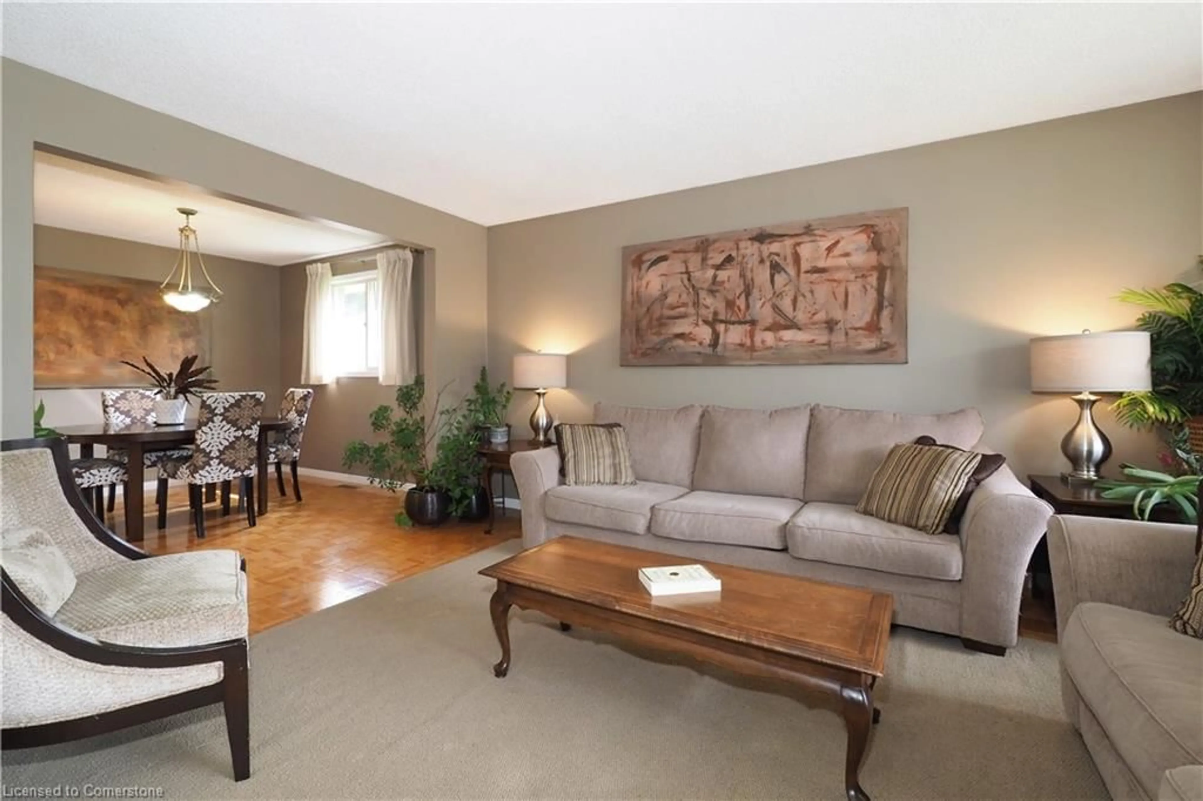 Living room with furniture, wood/laminate floor for 630 Red Pine Dr, Waterloo Ontario N2V 1S1