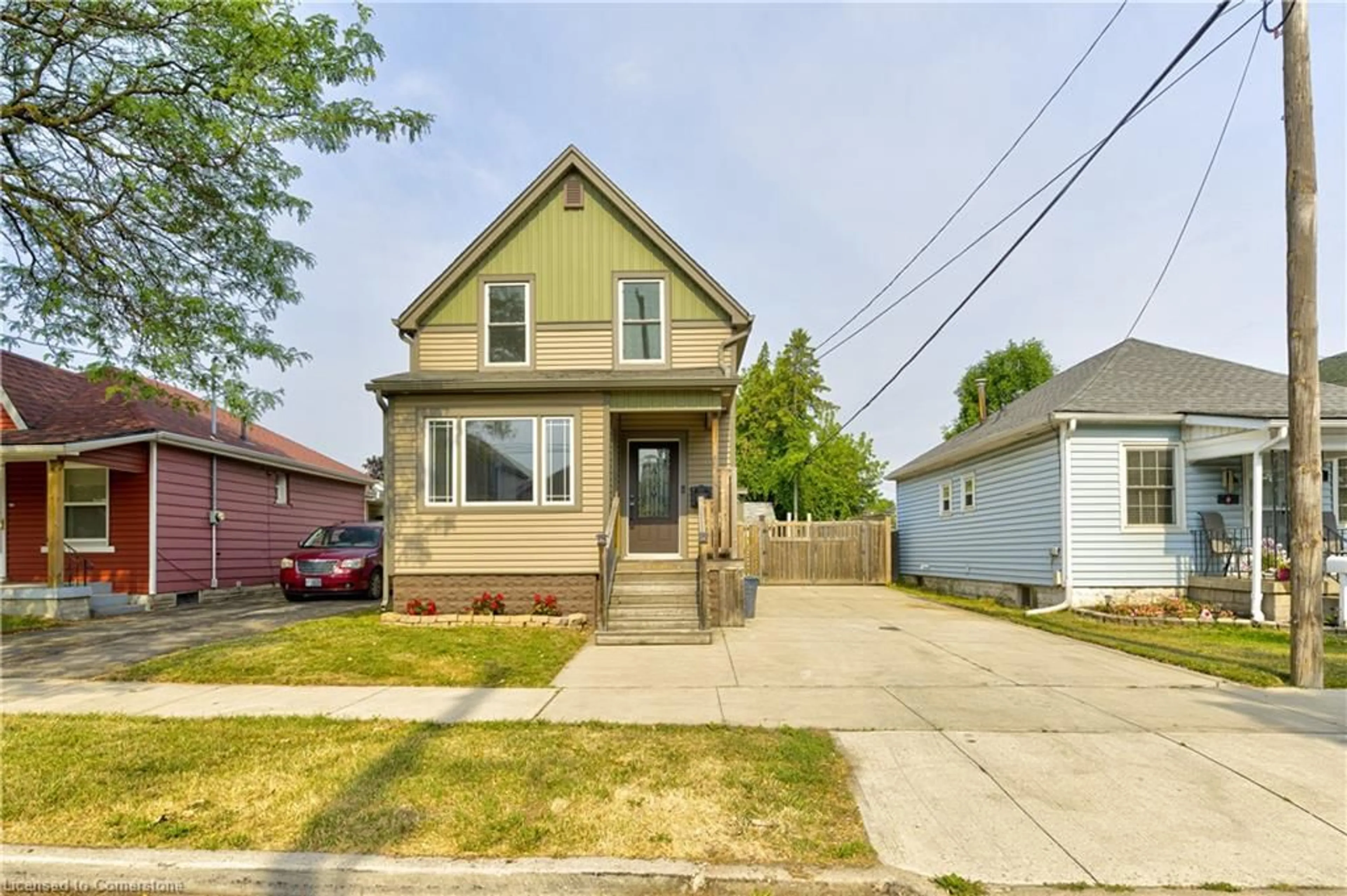 Home with vinyl exterior material, street for 49 Harmony Ave, Hamilton Ontario L8H 4X3
