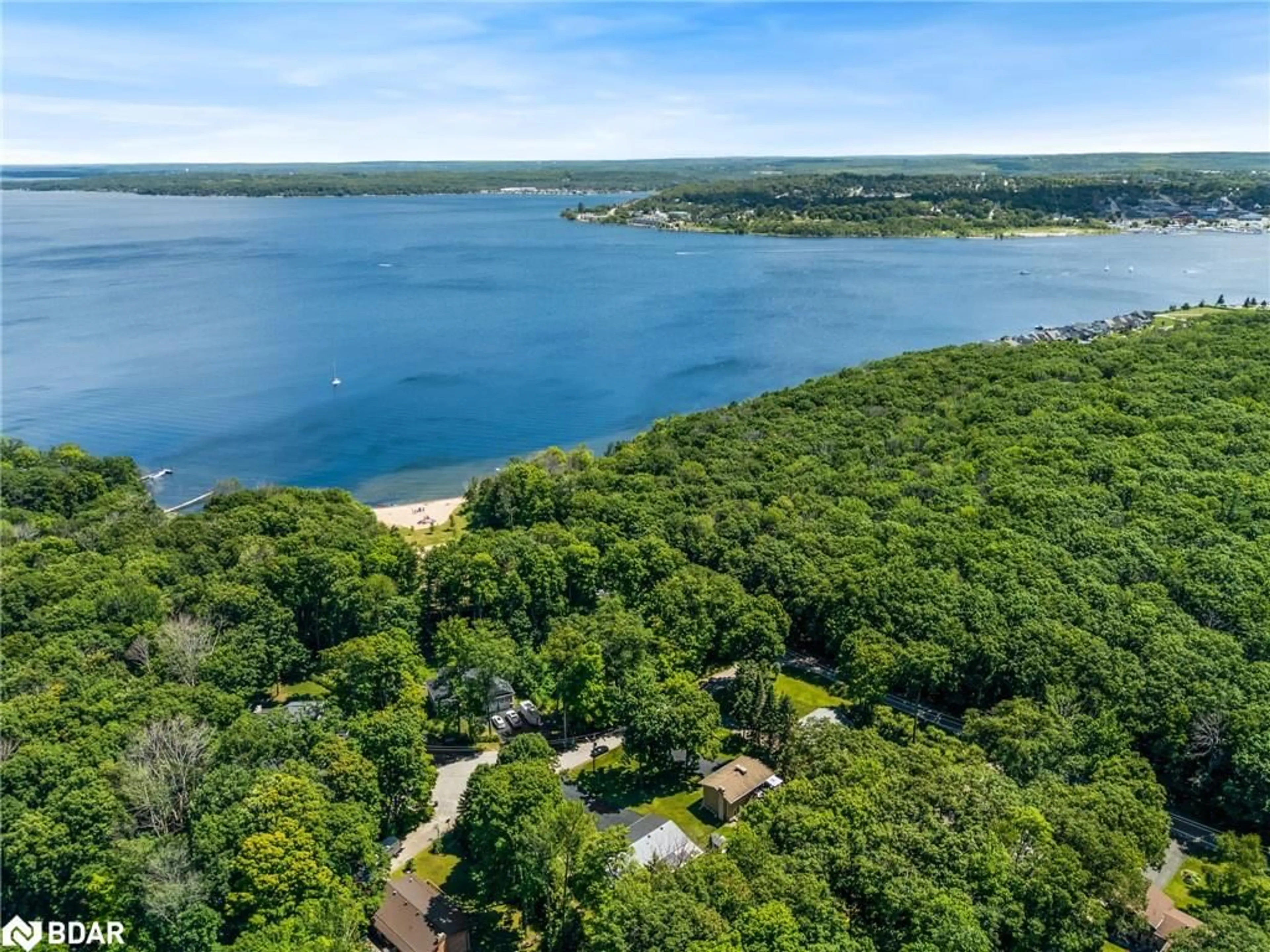 A pic from outside/outdoor area/front of a property/back of a property/a pic from drone, water/lake/river/ocean view for 470 Parkview Crt, Midland Ontario L4R 5G3
