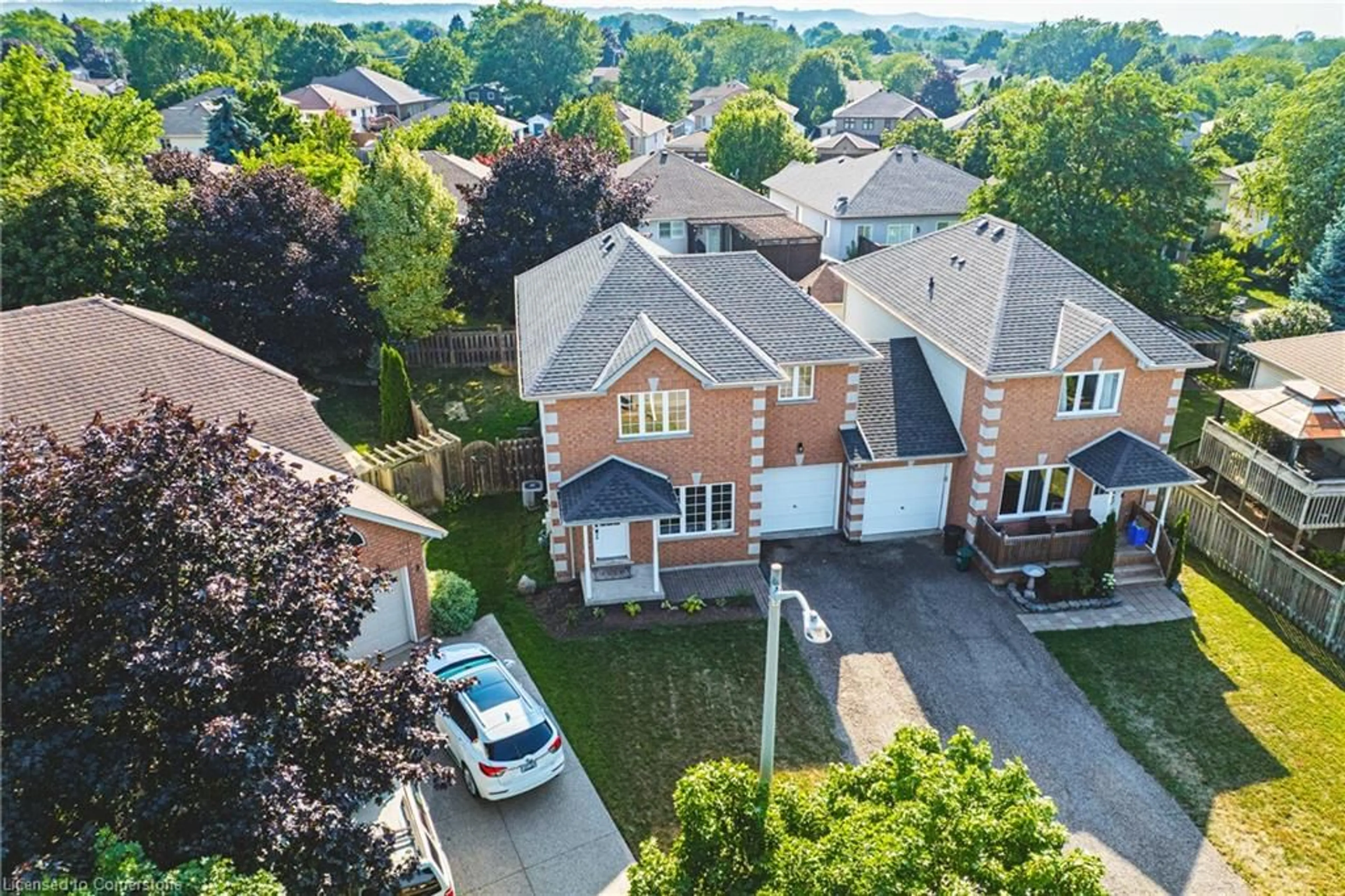 A pic from outside/outdoor area/front of a property/back of a property/a pic from drone, street for 4492 Weltman Way, Beamsville Ontario L3J 0G1