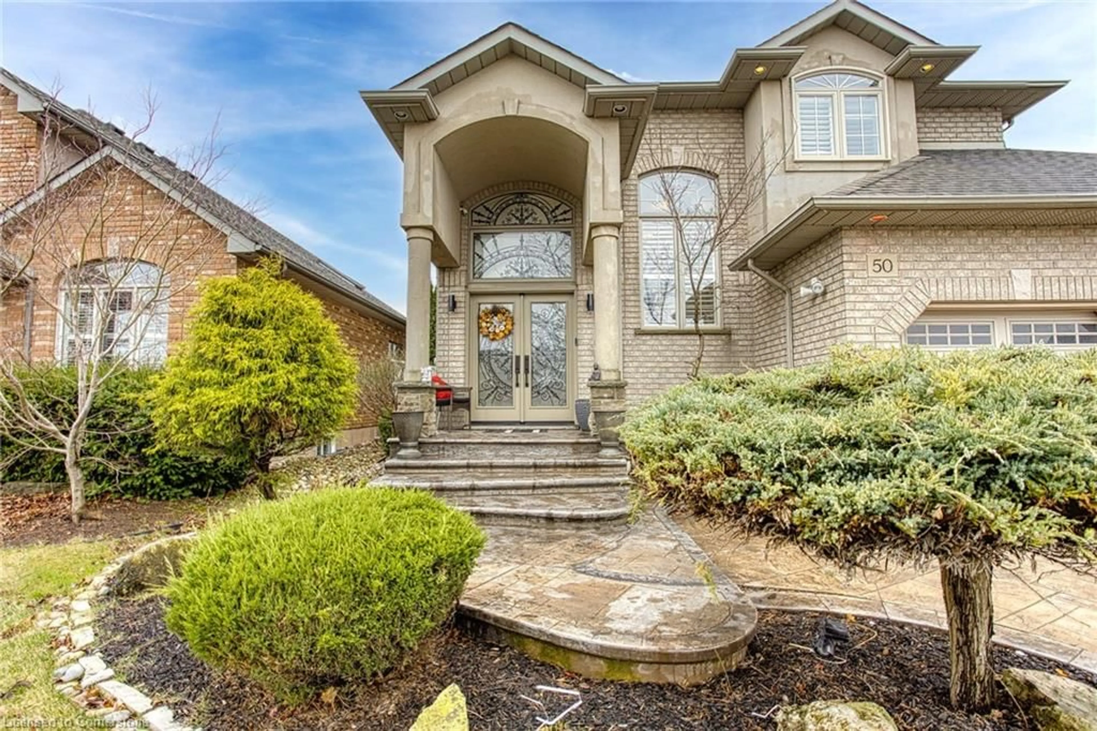 Home with brick exterior material, street for 50 Tuscani Dr, Hamilton Ontario L8E 5W4