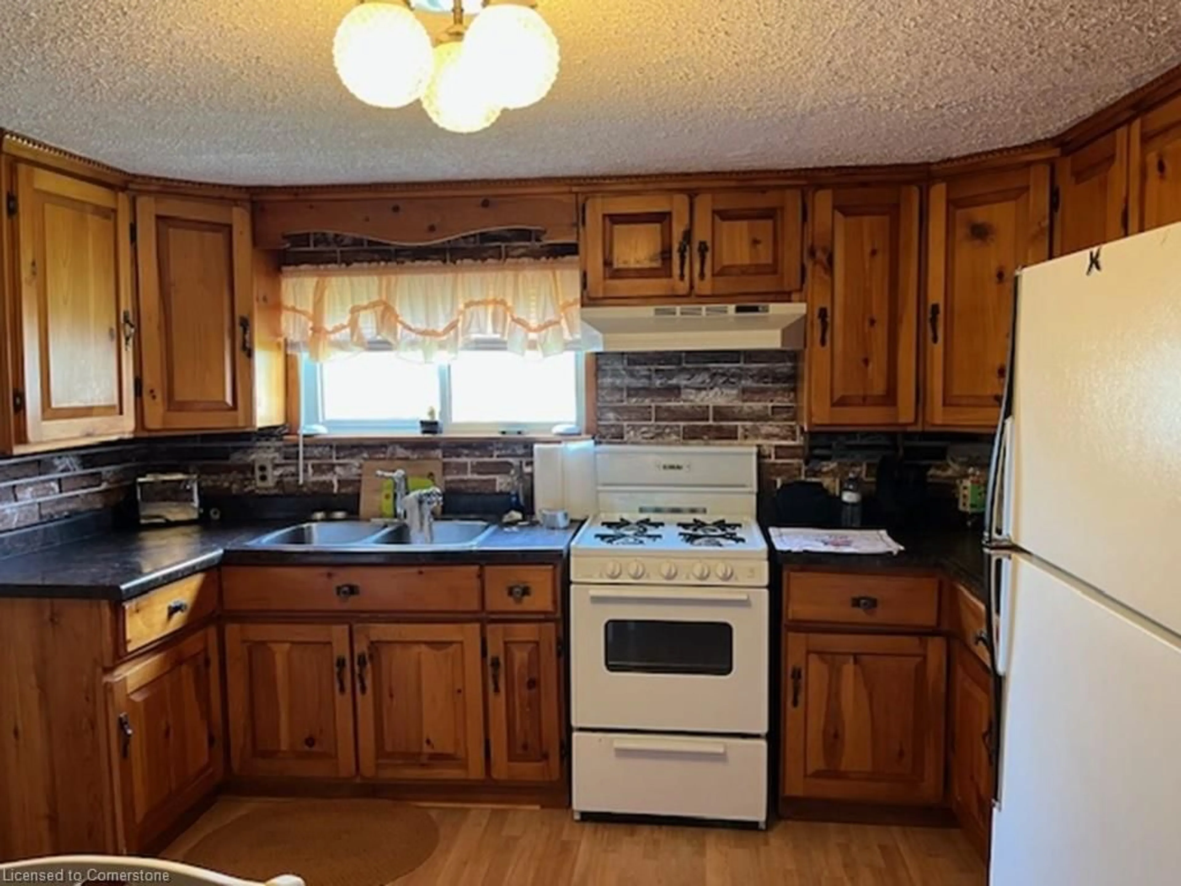 Standard kitchen, wood/laminate floor for 3 Holtby St, Walsingham Ontario N0E 1X0