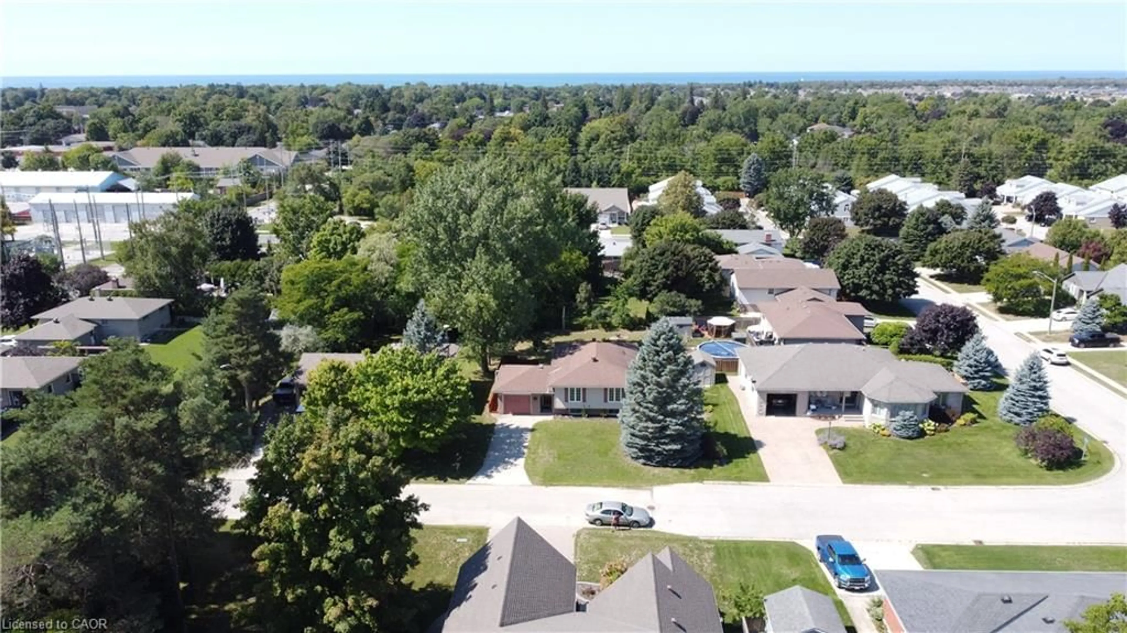 A pic from outside/outdoor area/front of a property/back of a property/a pic from drone, unknown for 804 Ruby St, Port Elgin Ontario N0H 2C4