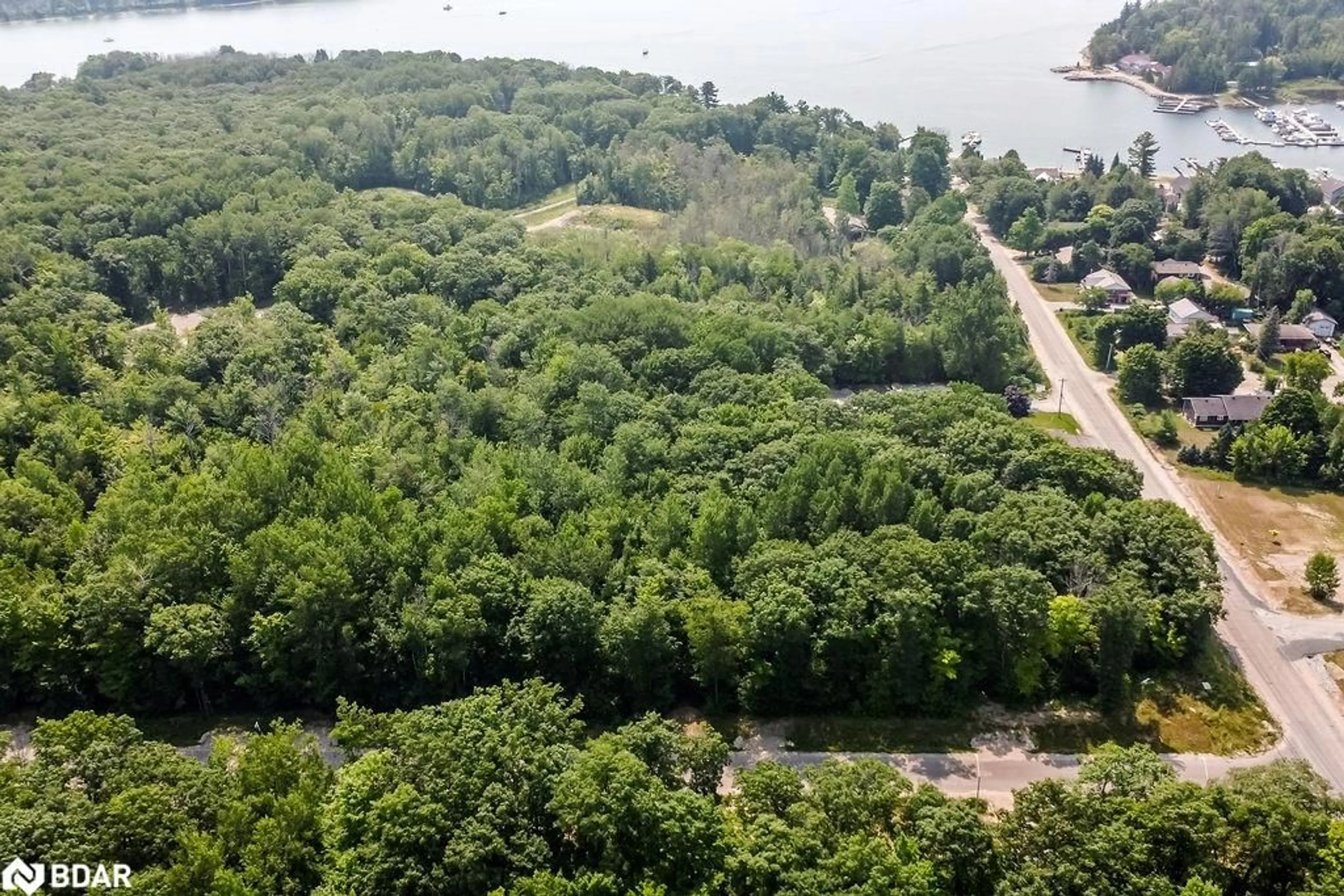 A pic from outside/outdoor area/front of a property/back of a property/a pic from drone, water/lake/river/ocean view for LT 45 Explorers Landng, Tiny Ontario L9M 0C2