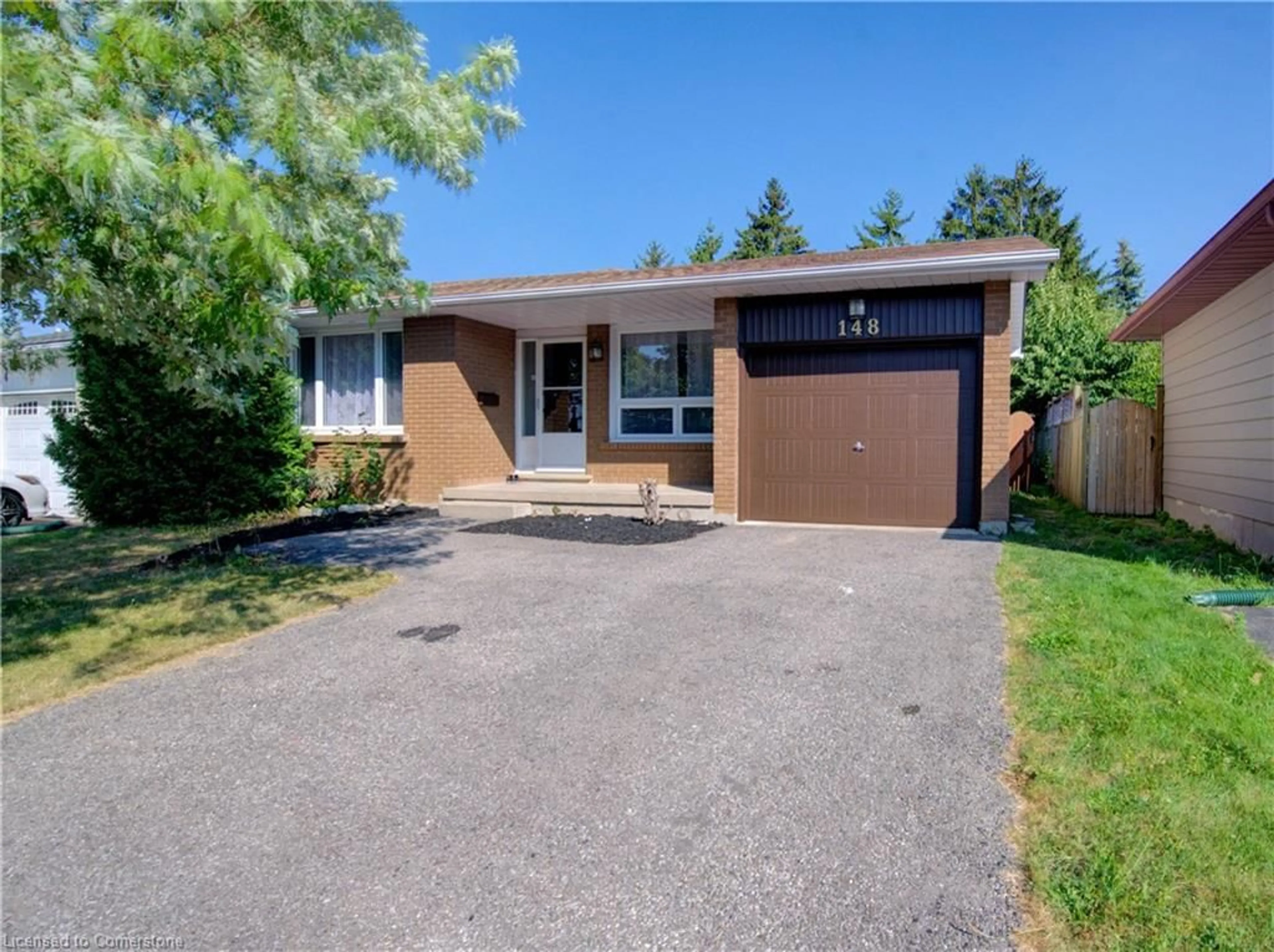 Home with brick exterior material, street for 148 Driftwood Dr, Kitchener Ontario N2N 1T1