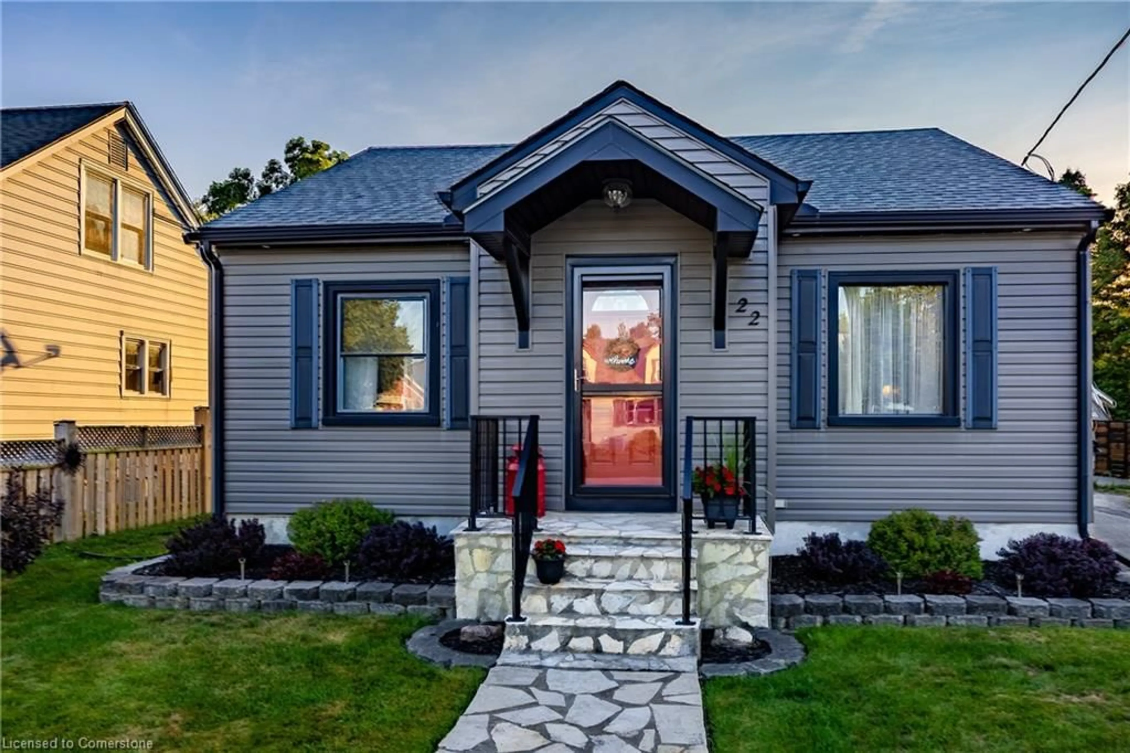 Home with vinyl exterior material, street for 22 Lee Ave, Simcoe Ontario N3Y 3K2