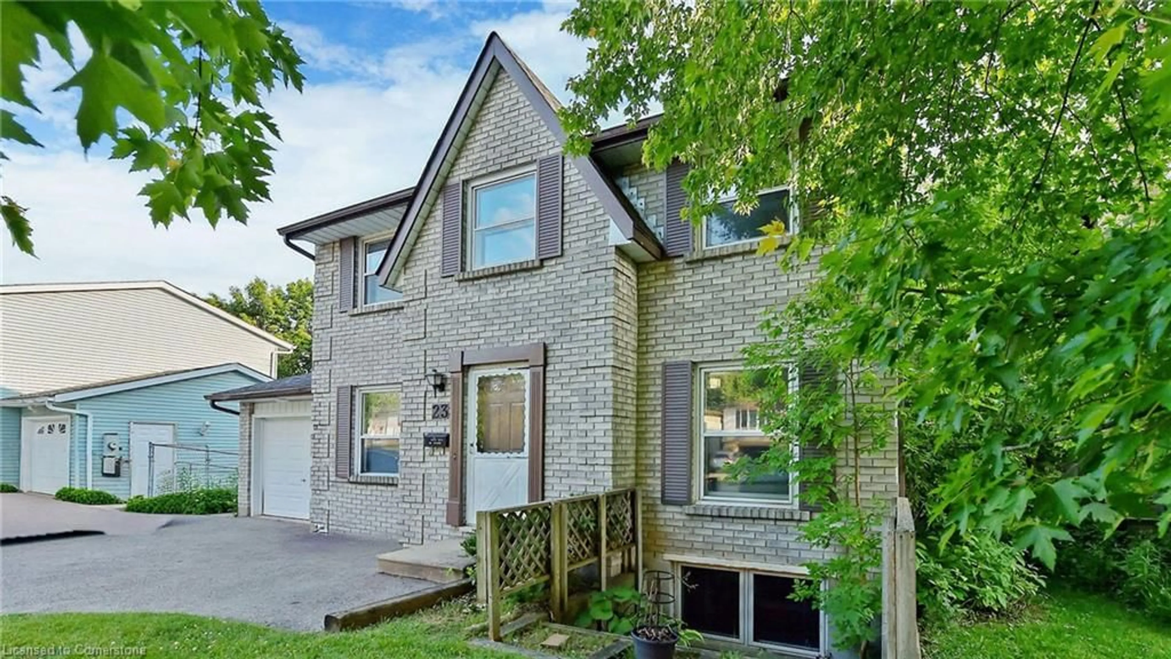 Home with brick exterior material, street for 23 Briarlea Rd, Guelph Ontario N1G 3H4