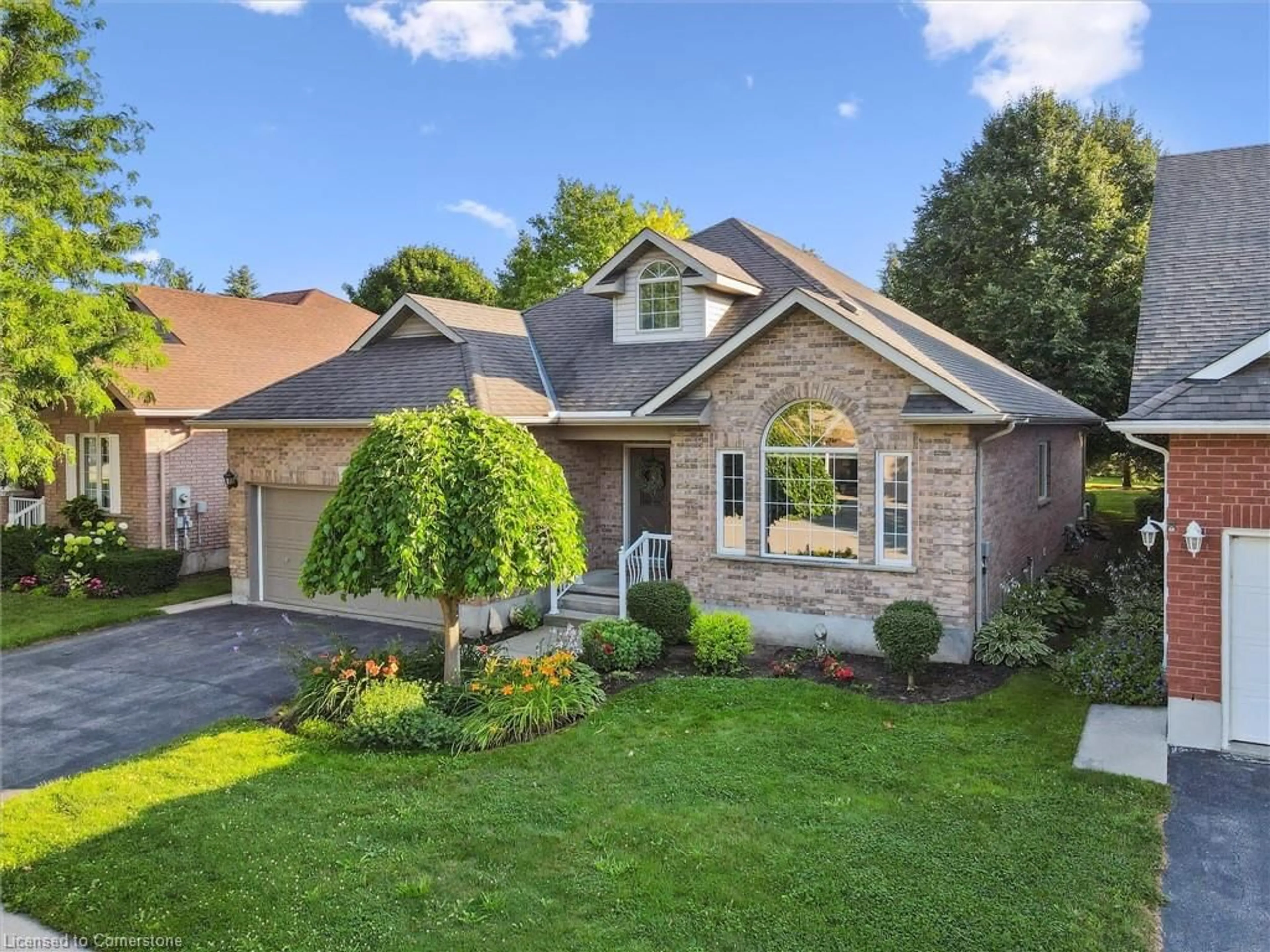 Home with brick exterior material, street for 11 Parkside Dr, Guelph Ontario N1G 4X7