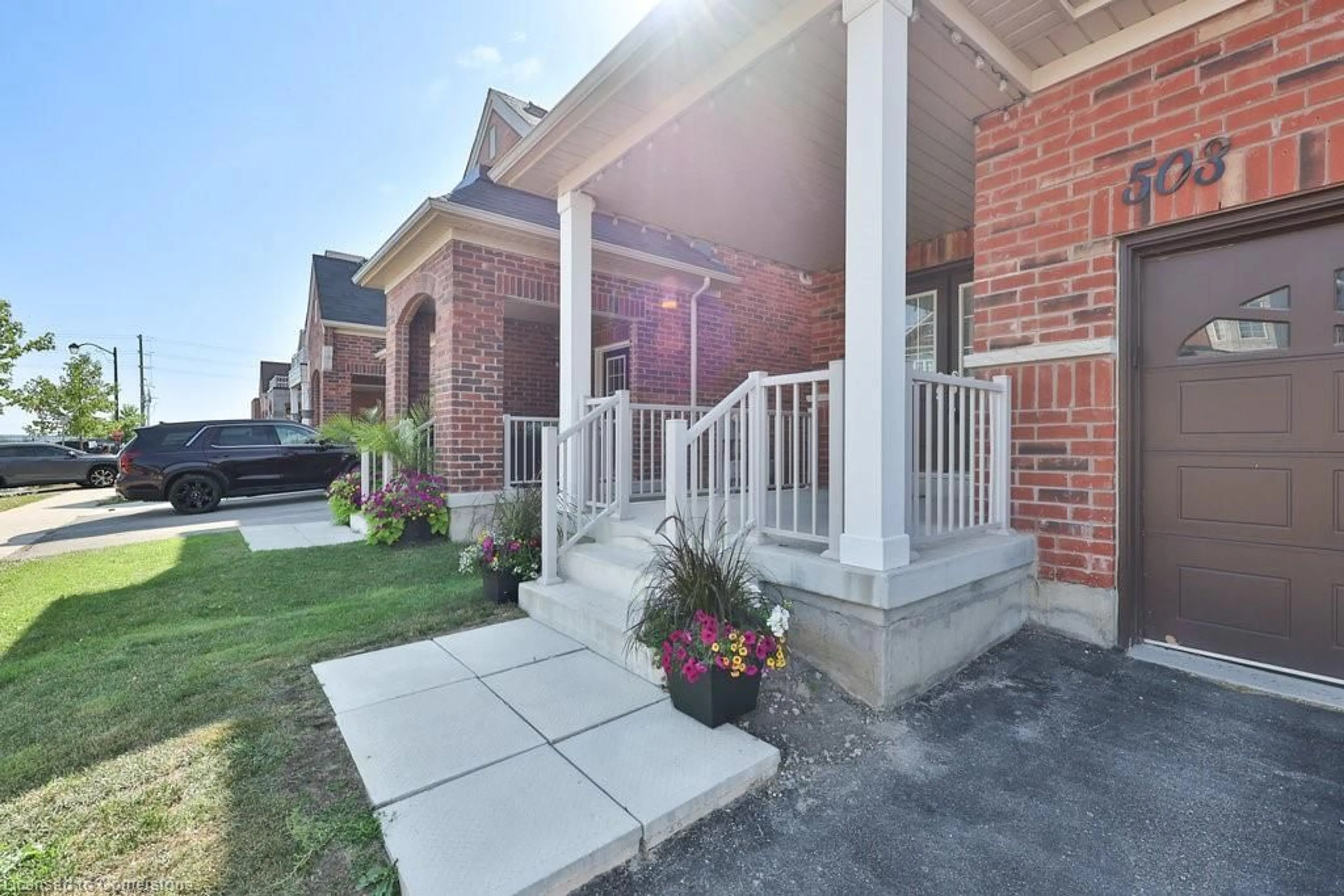 Home with brick exterior material, street for 503 Downes Jackson Hts, Milton Ontario L9T 8W2