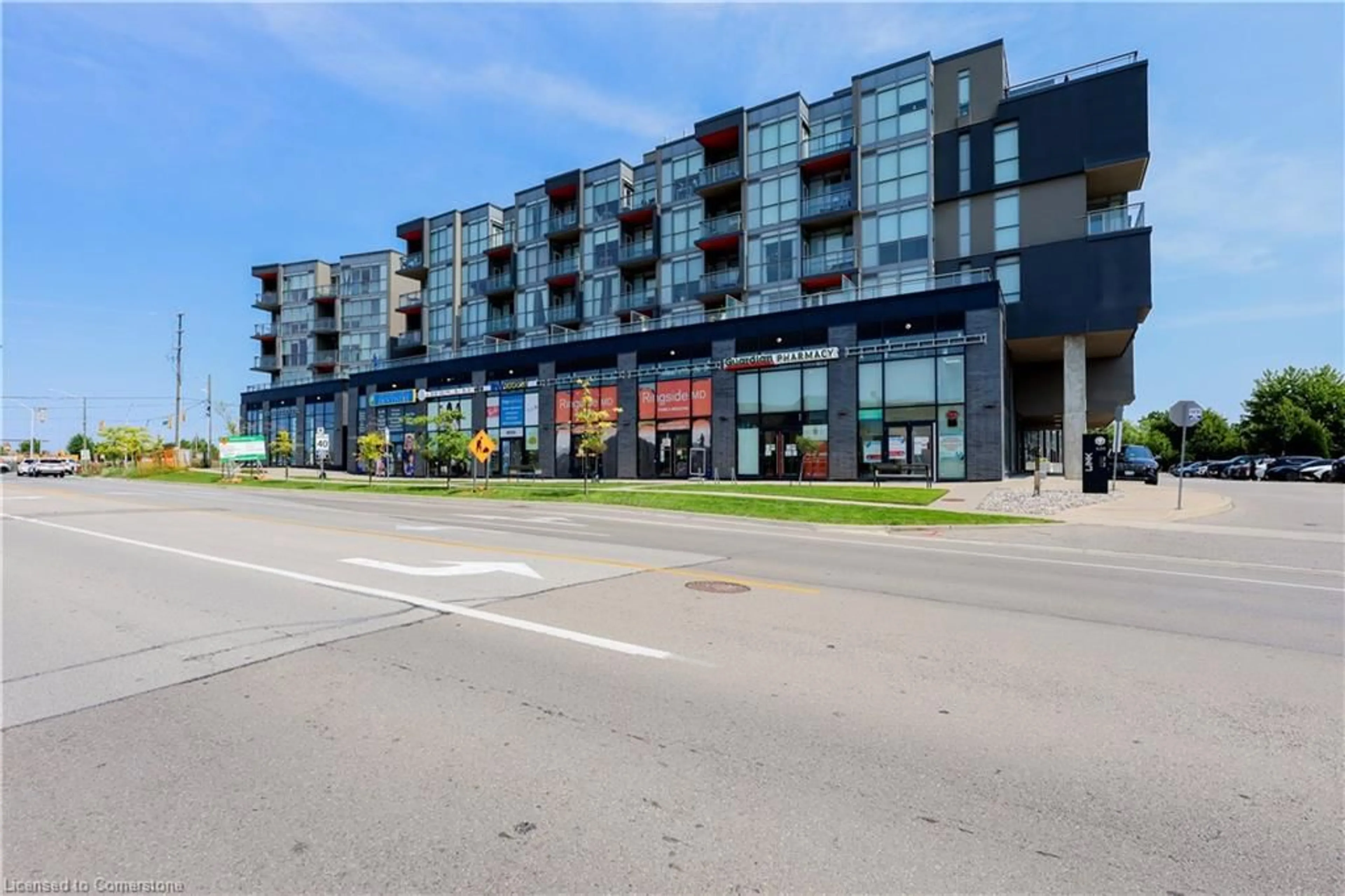 A pic from outside/outdoor area/front of a property/back of a property/a pic from drone, street for 5240 Dundas St #B215, Burlington Ontario L7L 0J6