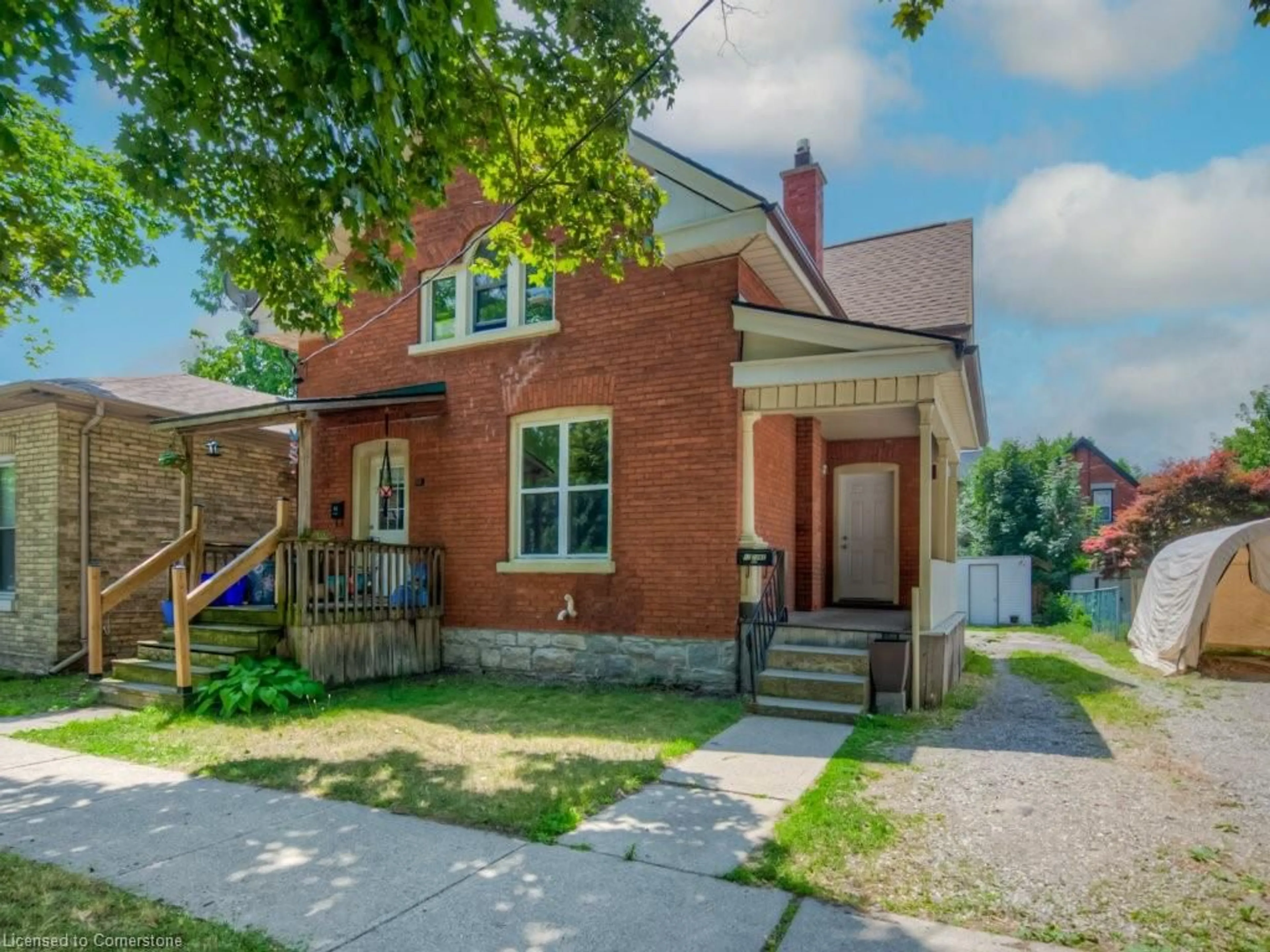 Home with brick exterior material, street for 12 Duke St, Brantford Ontario N3T 3T3